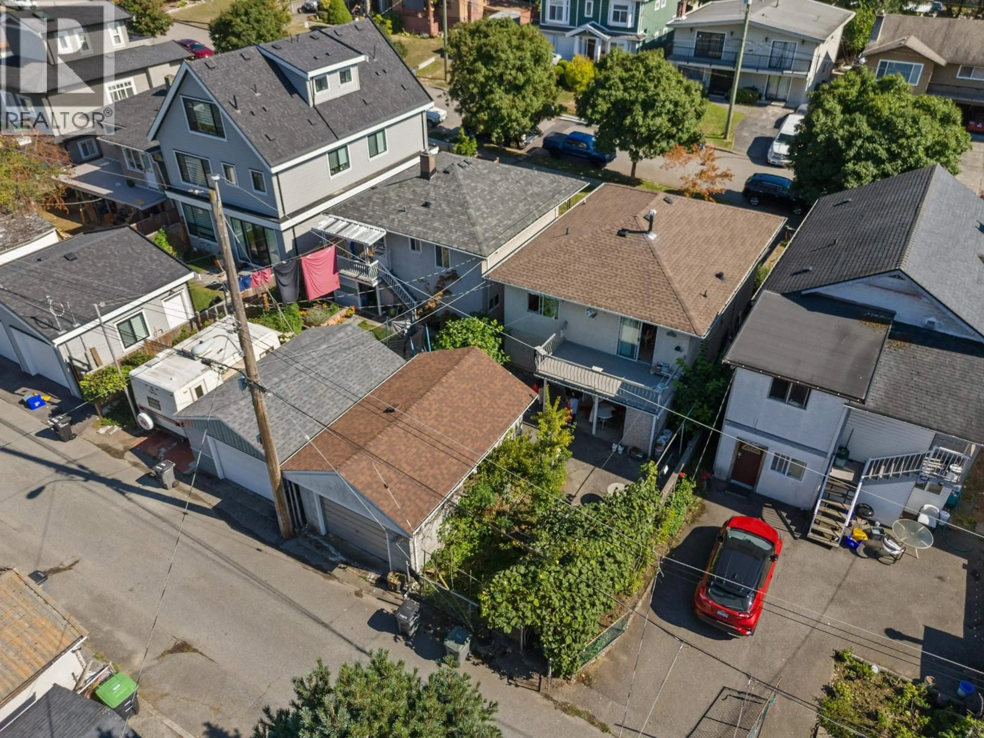 A pic from outside/outdoor area/front of a property/back of a property/a pic from drone, street for 5131 ANN STREET, Vancouver British Columbia V5R4J8