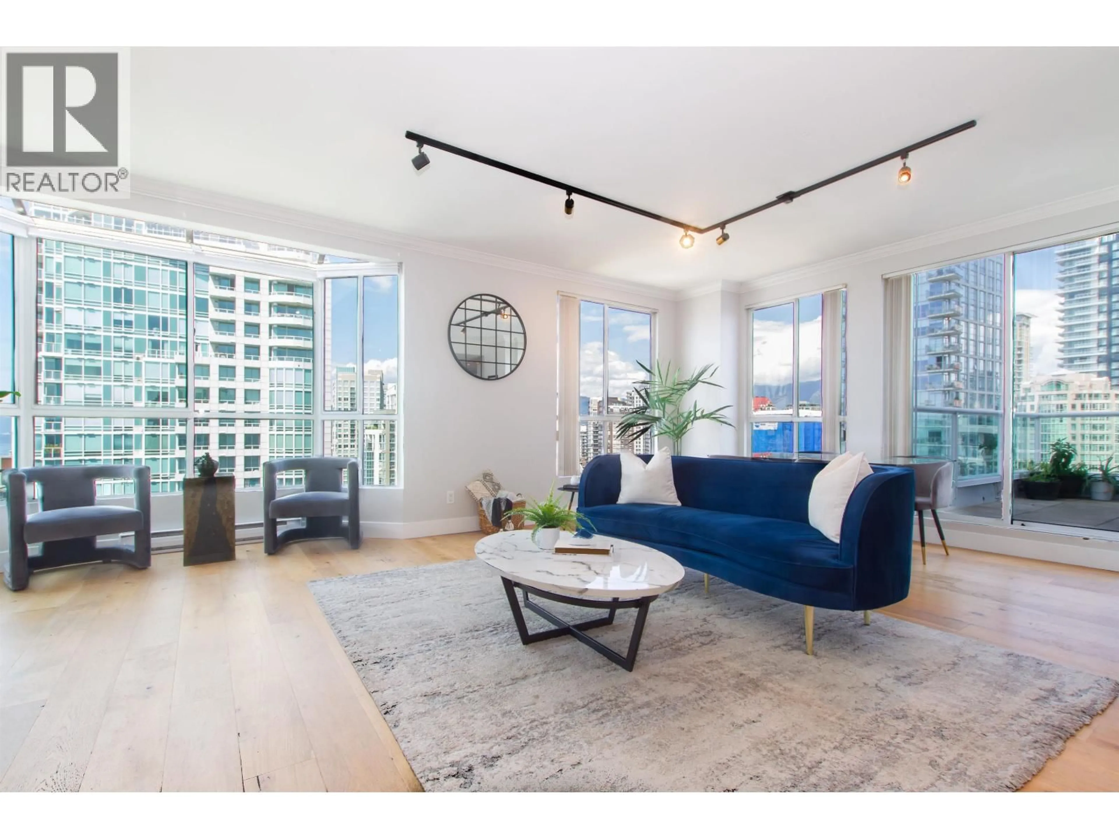 Living room with furniture, wood/laminate floor for 2301 - 1500 HOWE STREET, Vancouver British Columbia V6Z2N1