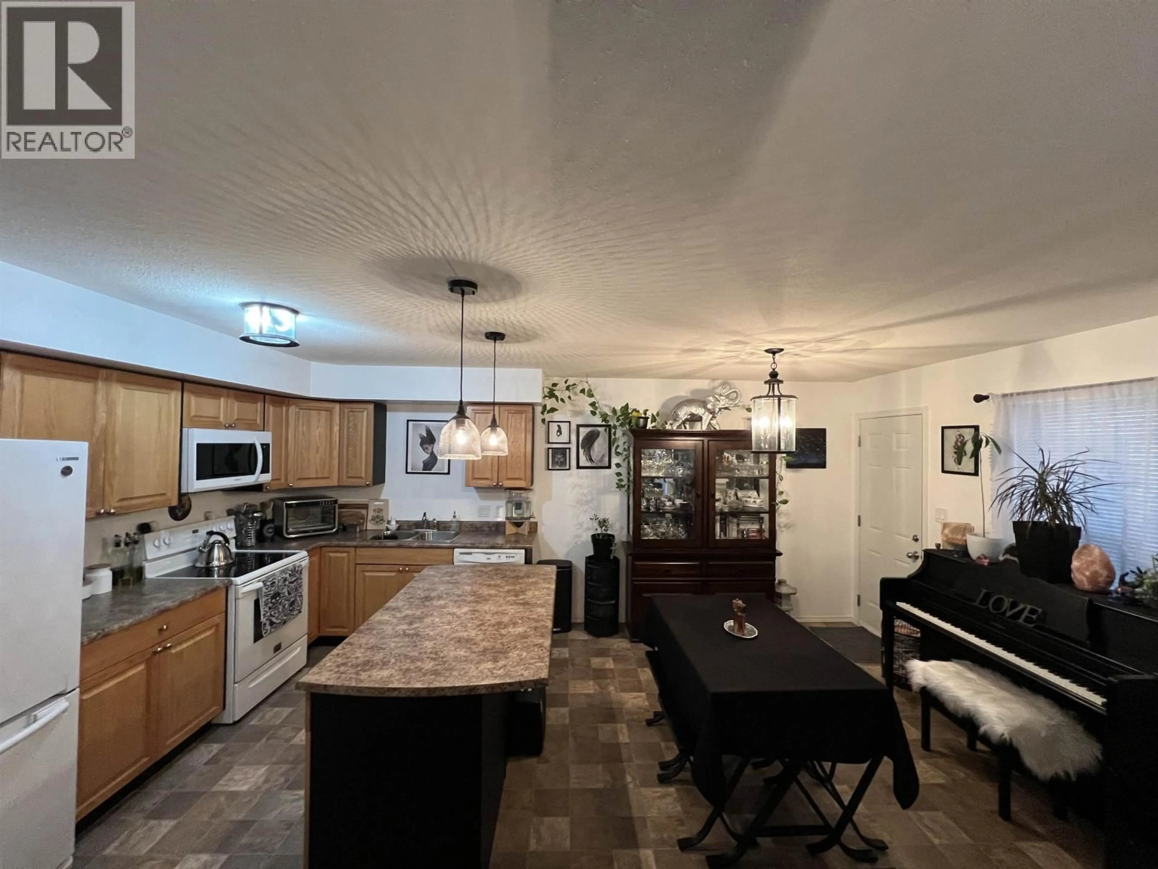 Open concept kitchen, unknown for 7 - 4620 52 AVENUE, Fort Nelson British Columbia V0C1R0