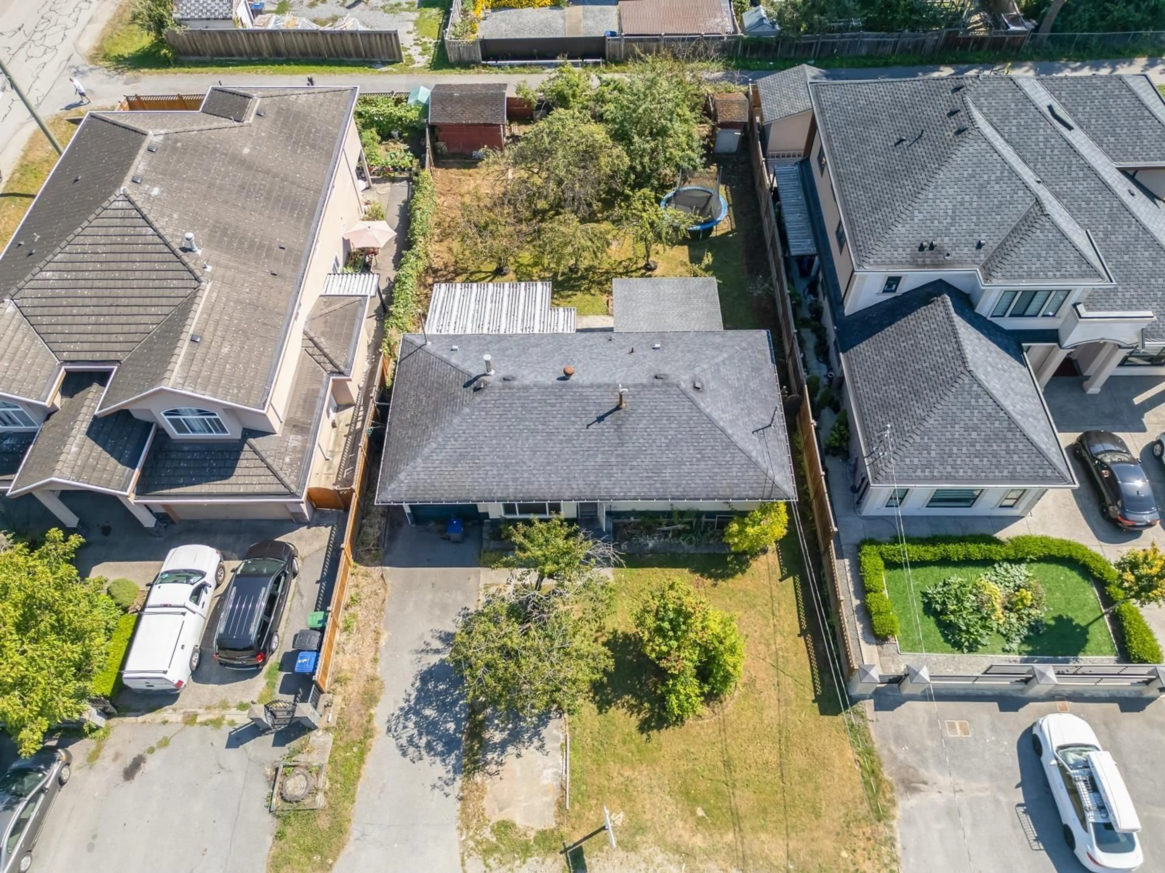 A pic from outside/outdoor area/front of a property/back of a property/a pic from drone, street for 10286 148A STREET, Surrey British Columbia V3R3Z2