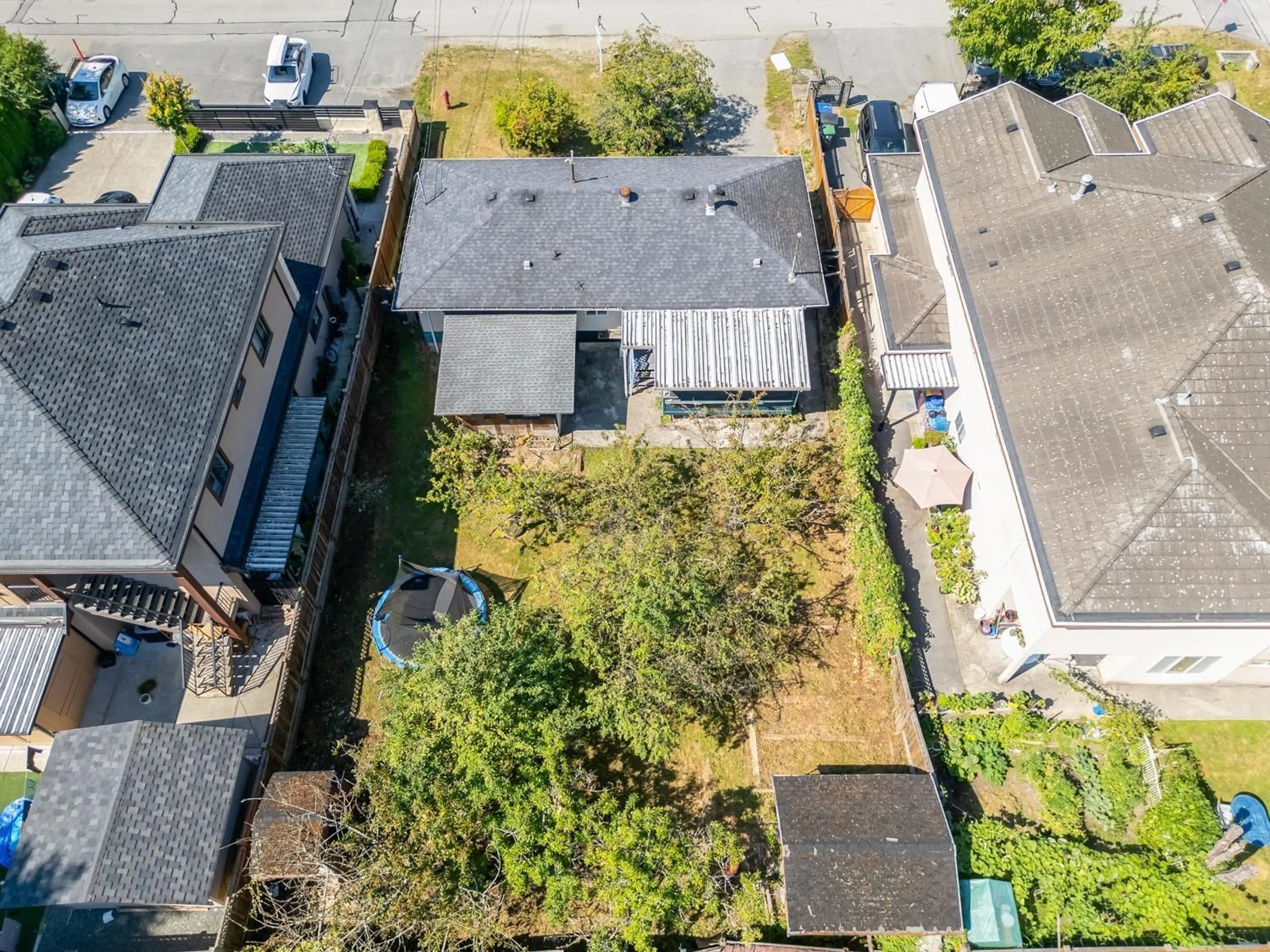 A pic from outside/outdoor area/front of a property/back of a property/a pic from drone, street for 10286 148A STREET, Surrey British Columbia V3R3Z2