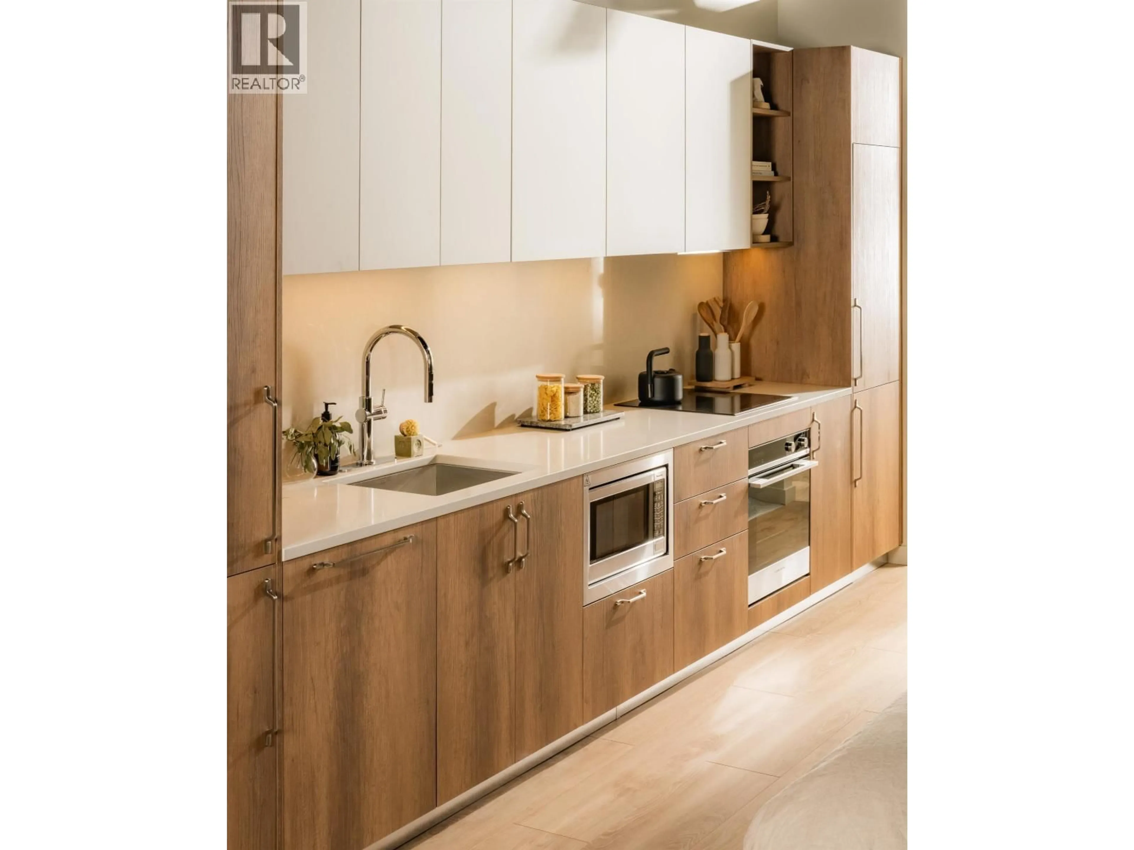 Contemporary kitchen, wood/laminate floor for 419 - 133 49TH AVENUE, Vancouver British Columbia V5Z2S3