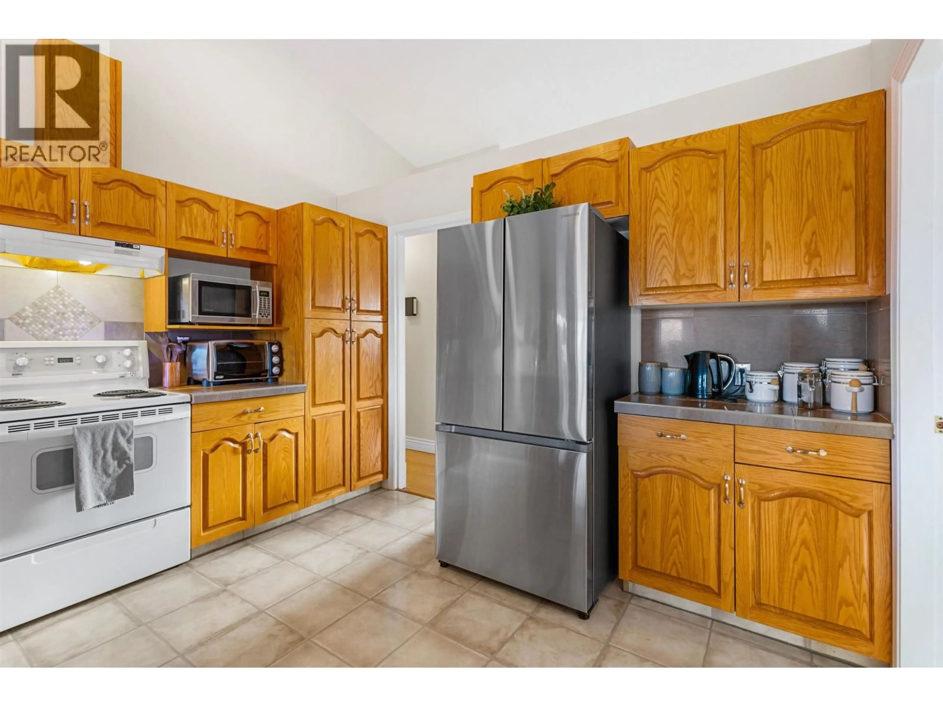 Standard kitchen, ceramic/tile floor for 4436 STAUBLE ROAD, Prince George British Columbia V2K4X3