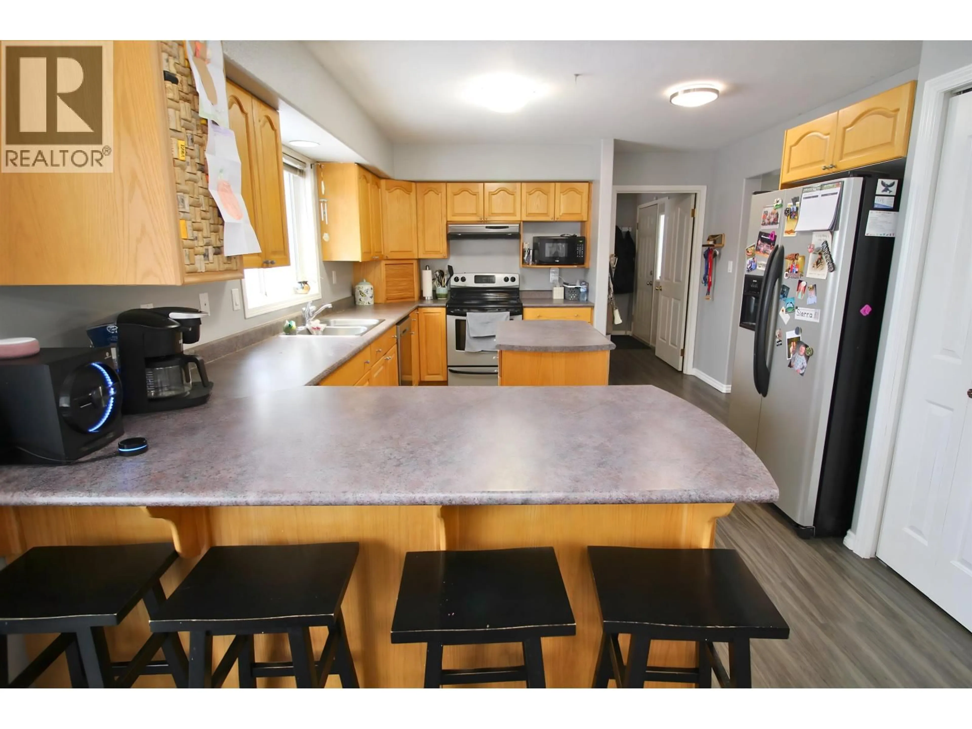Open concept kitchen, wood/laminate floor for 3261 5TH STREET, Houston British Columbia V0J1Z0