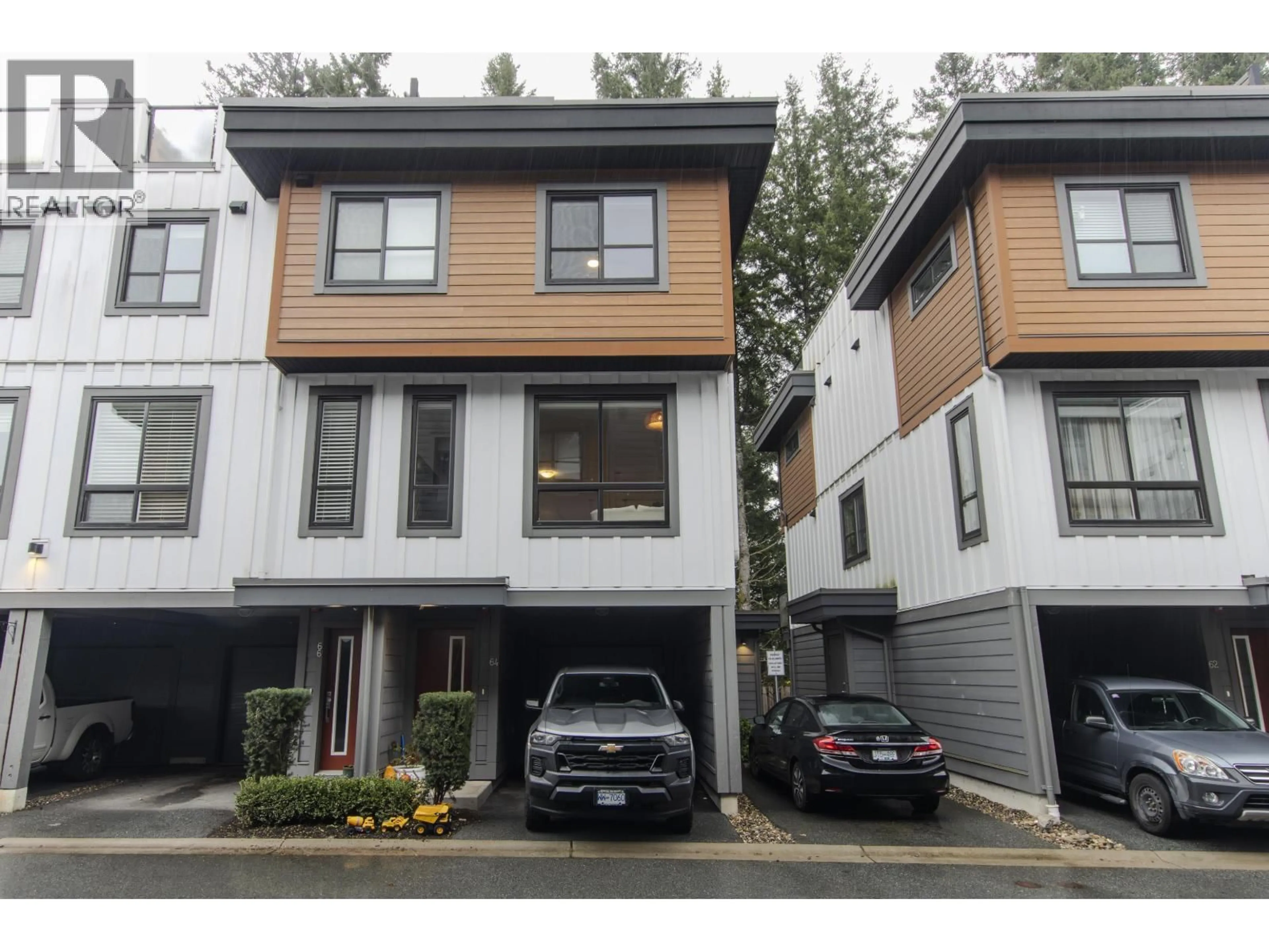 Home with vinyl exterior material, street for 64 - 39769 GOVERNMET ROAD, Squamish British Columbia V8B0Z1