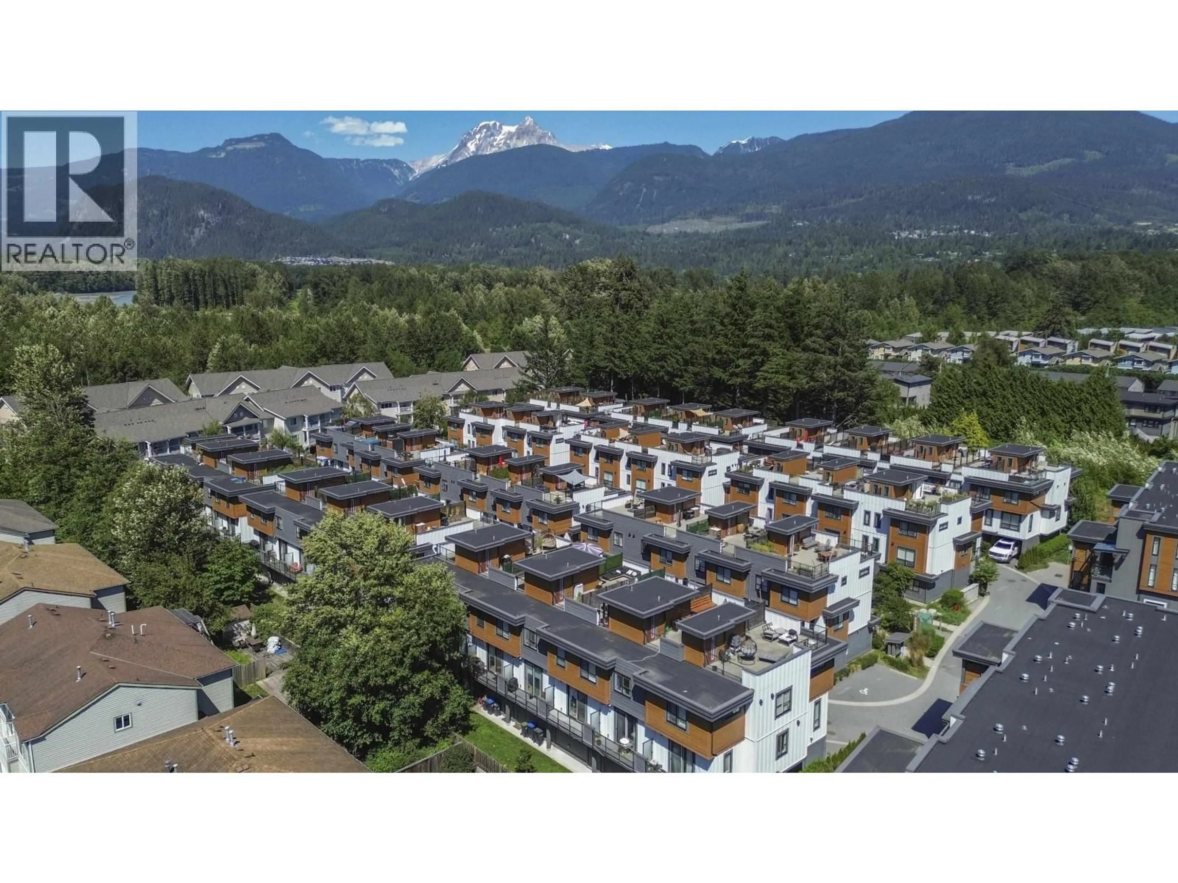 A pic from outside/outdoor area/front of a property/back of a property/a pic from drone, mountain view for 64 - 39769 GOVERNMET ROAD, Squamish British Columbia V8B0Z1