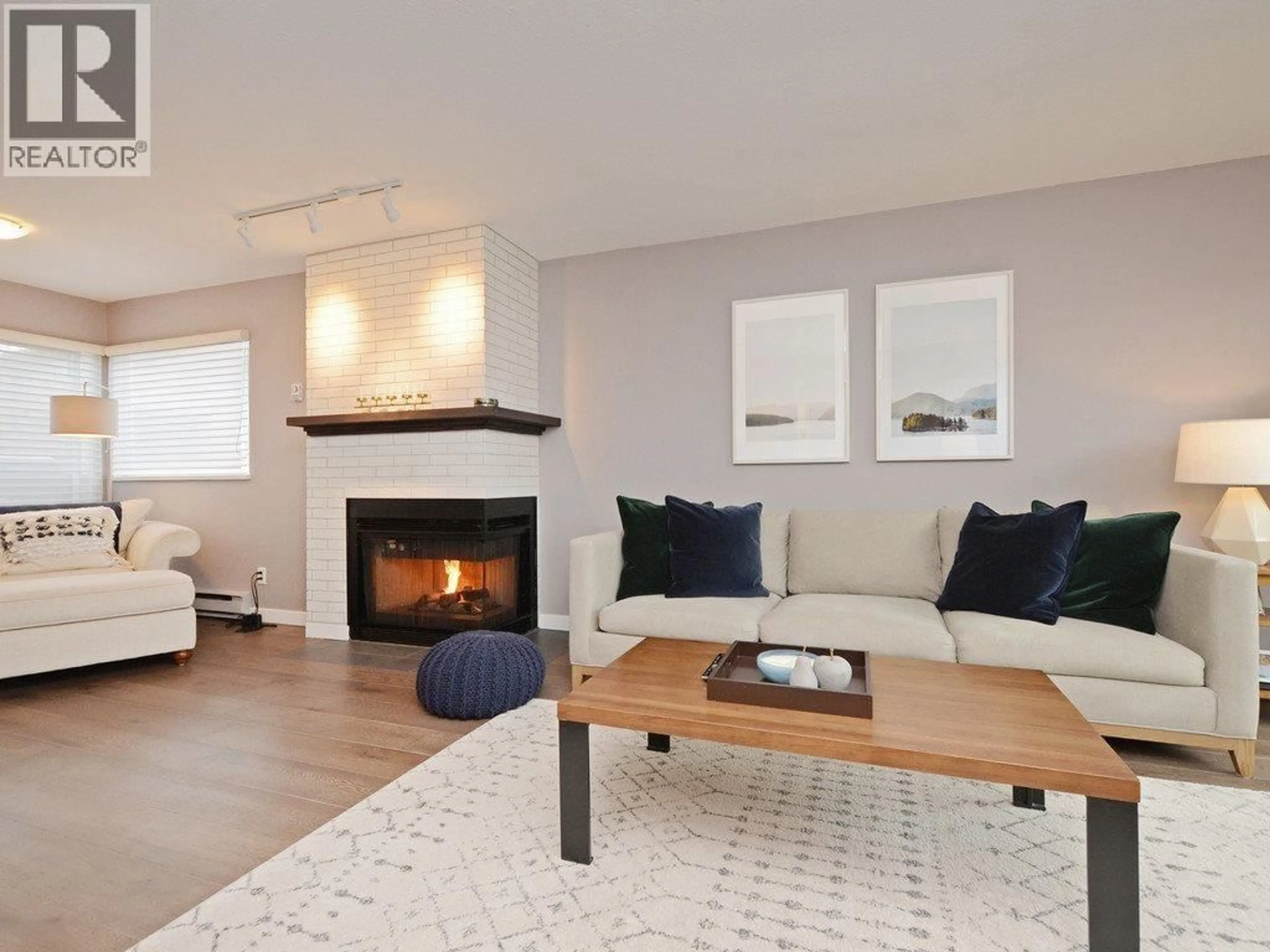 Living room with furniture, wood/laminate floor for 2136 EASTERN AVENUE, North Vancouver British Columbia V7L3G3