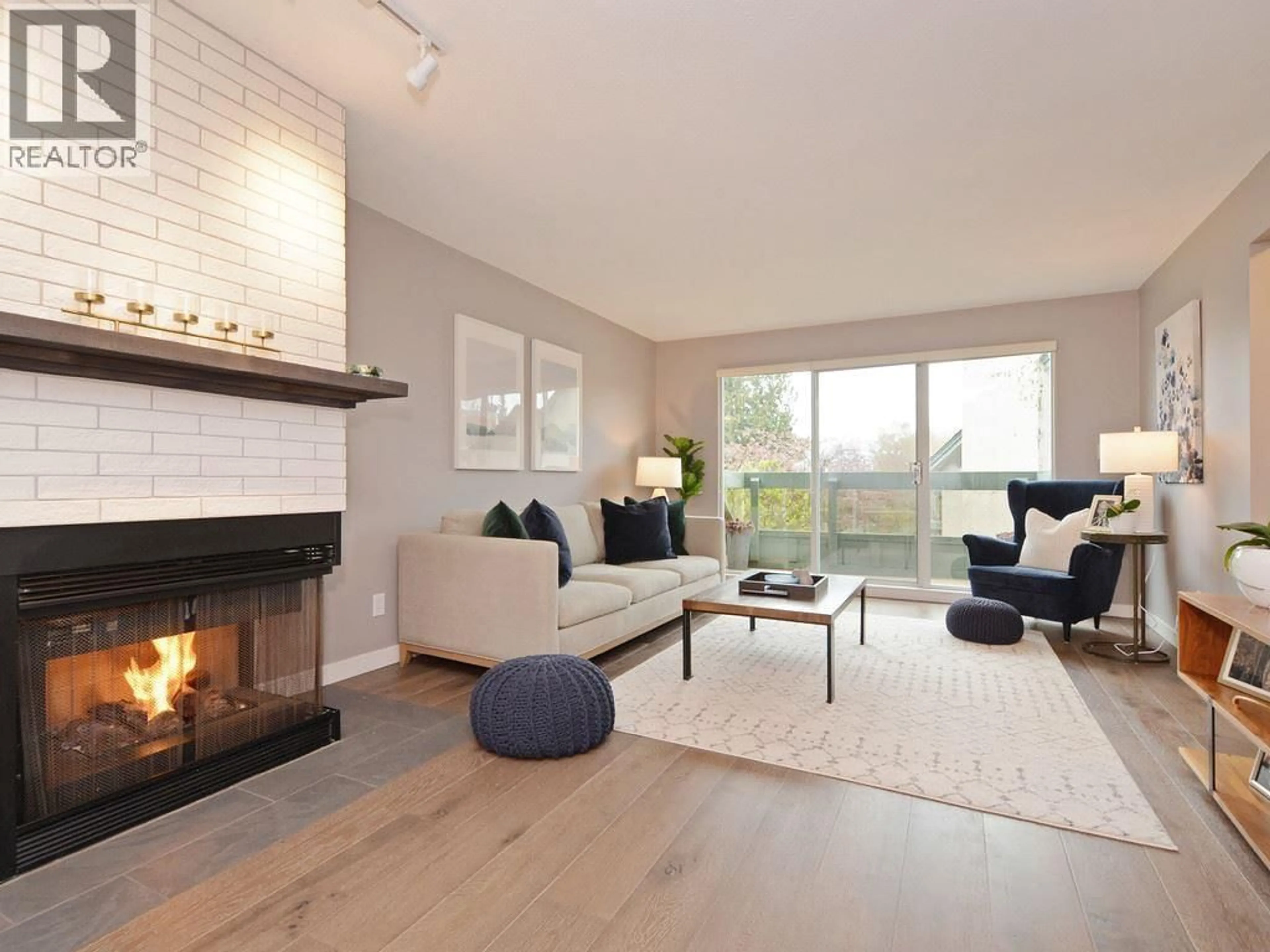 Living room with furniture, wood/laminate floor for 2136 EASTERN AVENUE, North Vancouver British Columbia V7L3G3