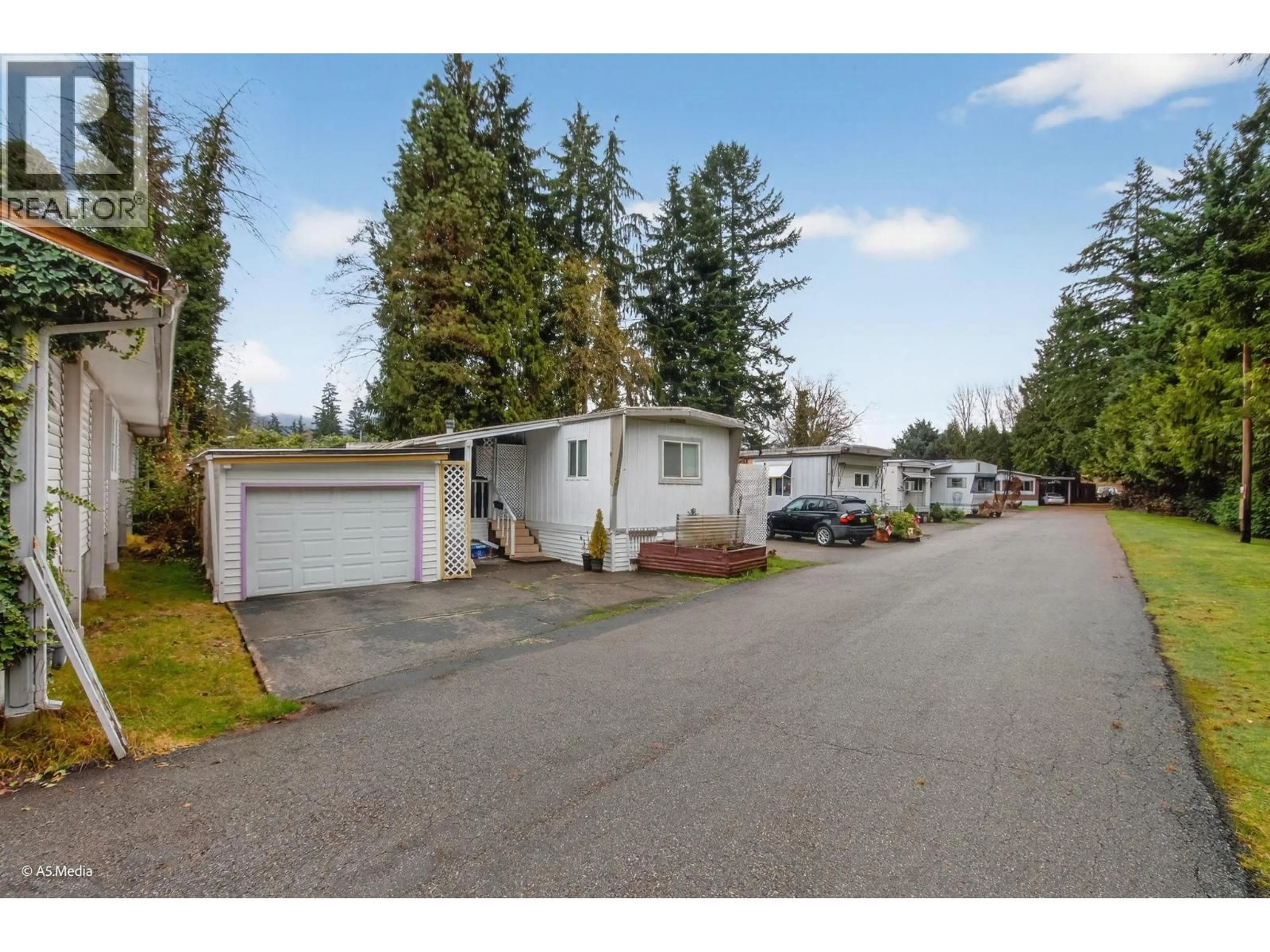 A pic from outside/outdoor area/front of a property/back of a property/a pic from drone, street for 52 - 4200 DEWDNEY TRUNK ROAD, Coquitlam British Columbia V3K2X8