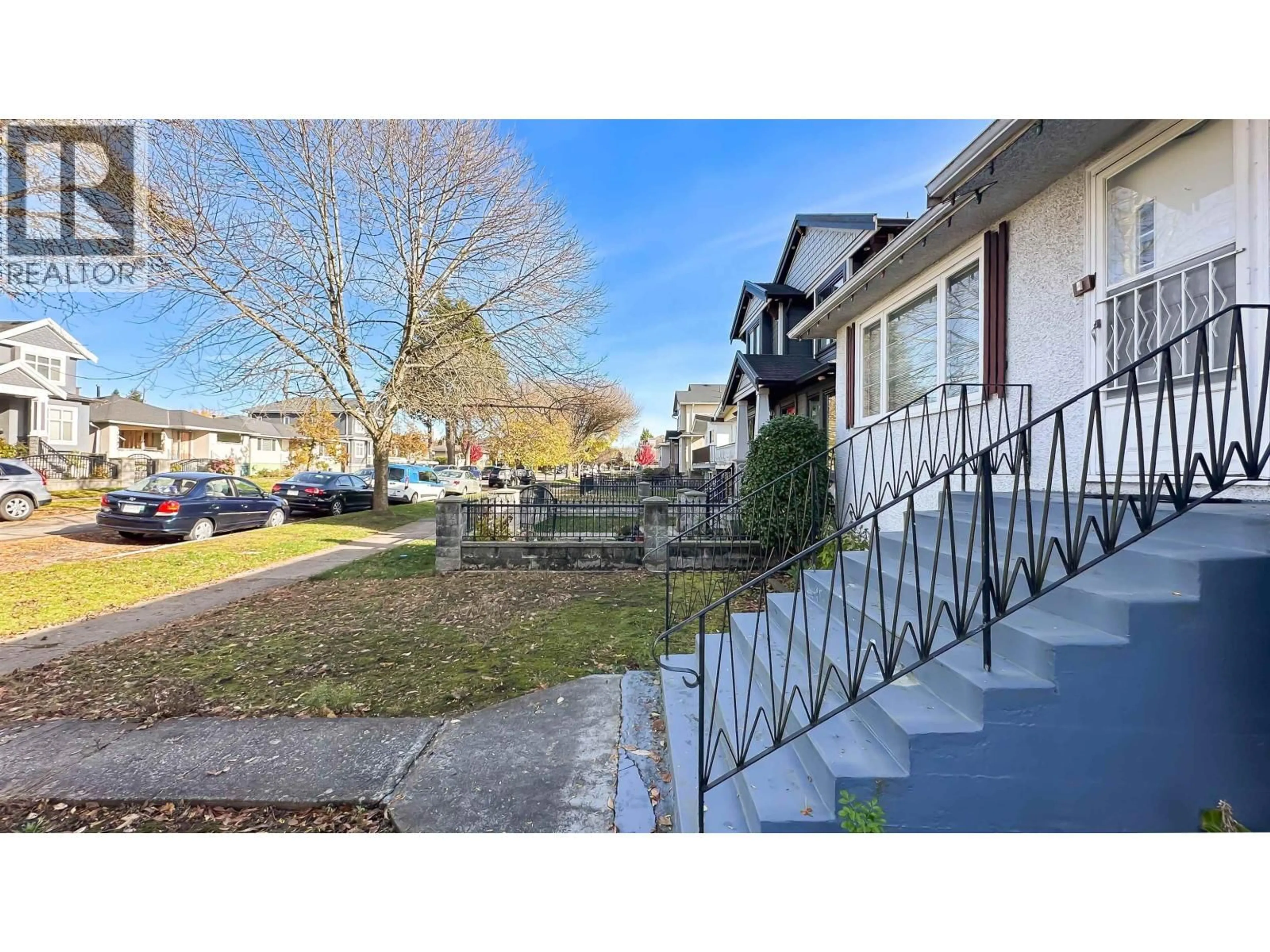 A pic from outside/outdoor area/front of a property/back of a property/a pic from drone, street for 3140 52ND AVENUE, Vancouver British Columbia V5S1T8