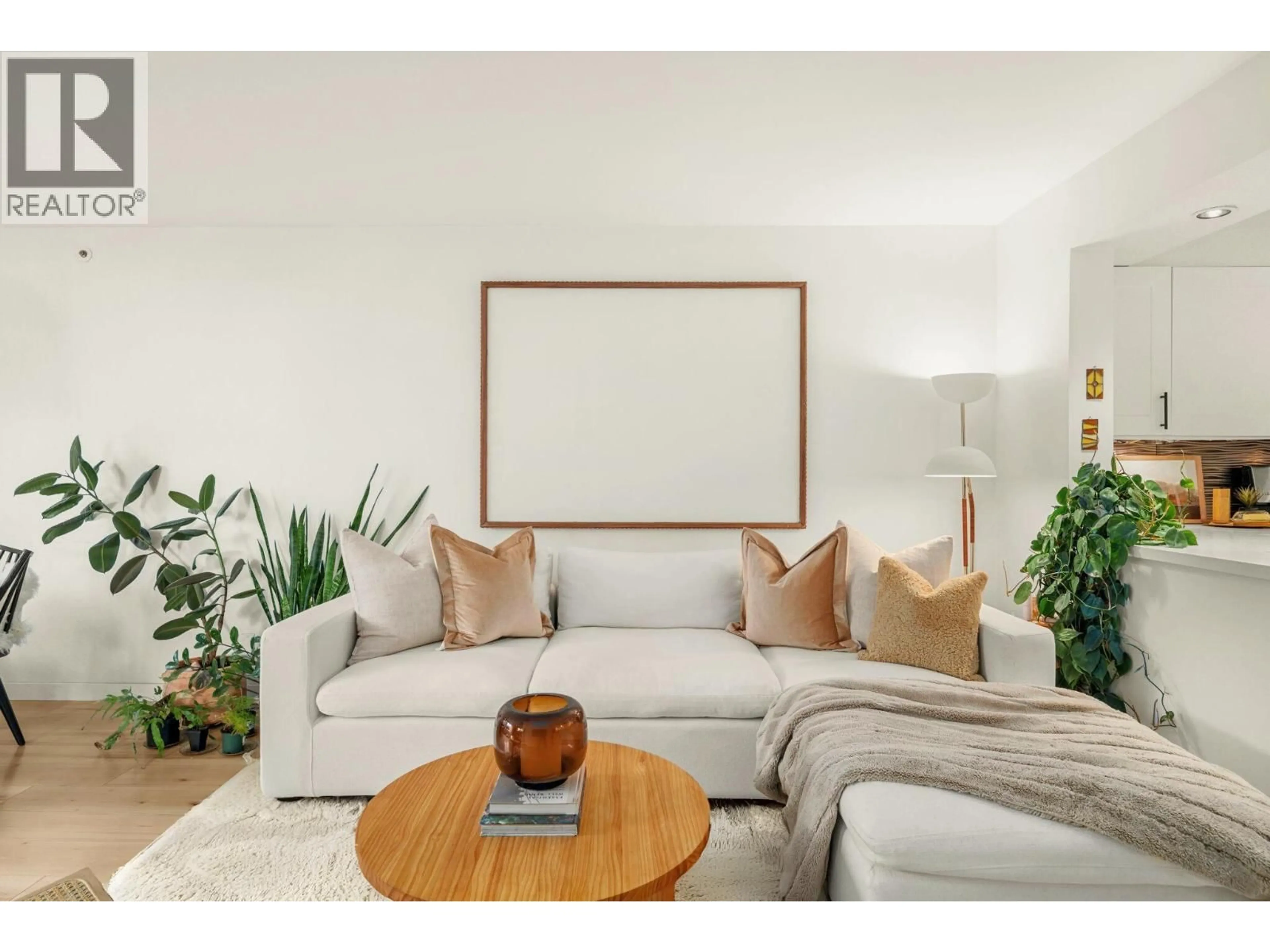 Living room with furniture, wood/laminate floor for 302 - 1438 7TH AVENUE, Vancouver British Columbia V6H1C1