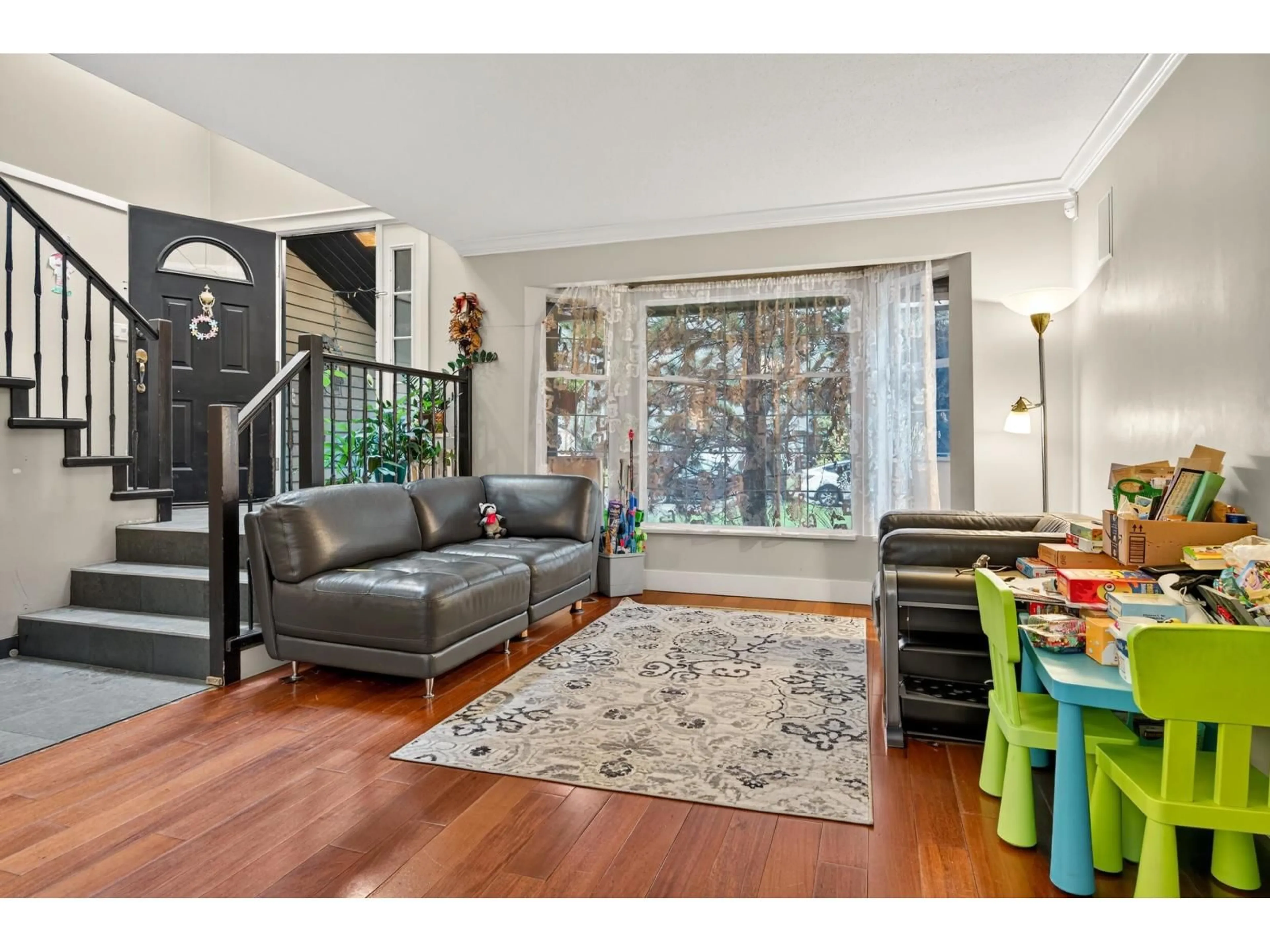 Living room with furniture, wood/laminate floor for 2382 150B STREET, Surrey British Columbia V4A8B1