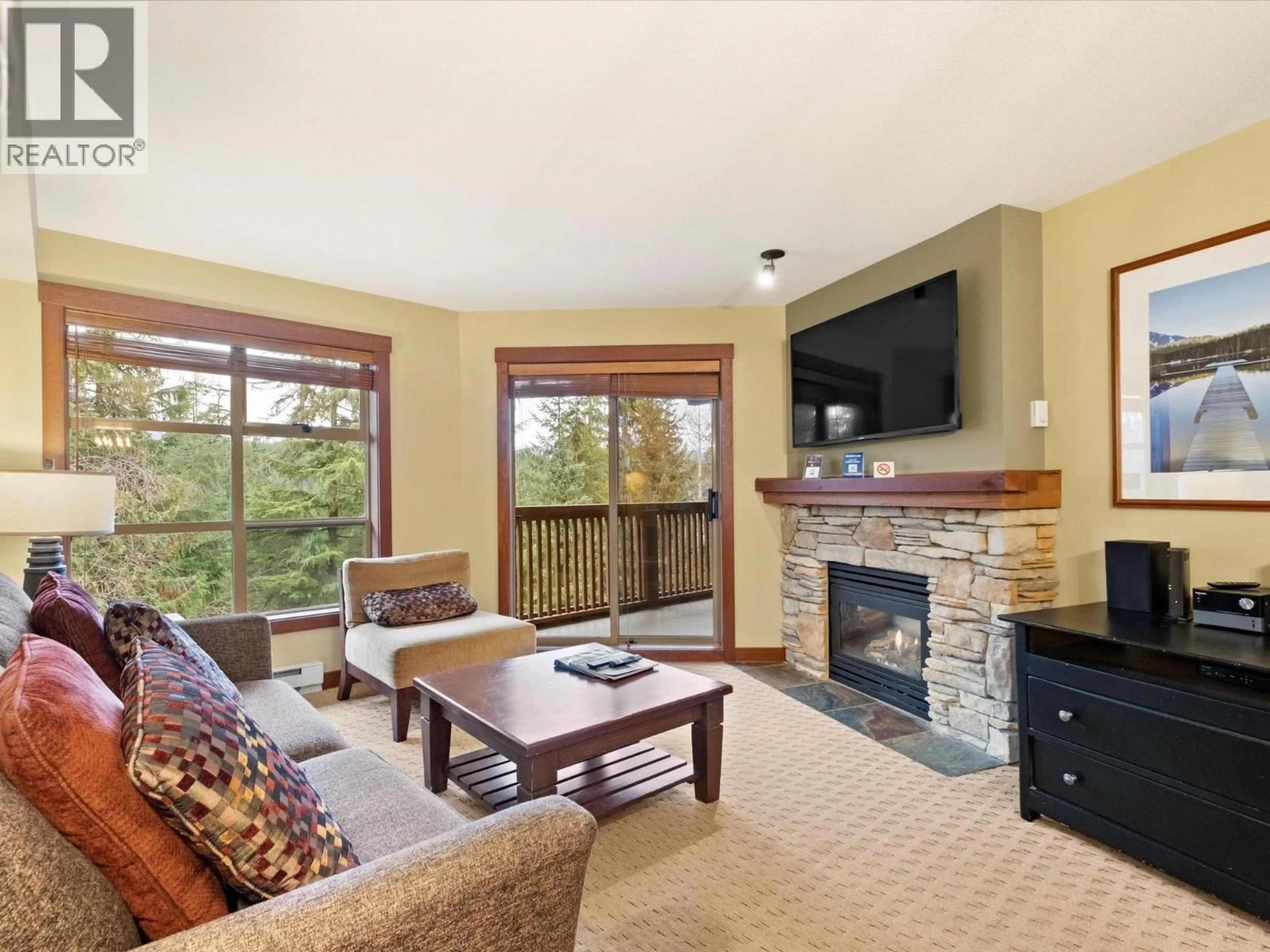 Living room with furniture, unknown for 412G3 - 4653 BLACKCOMB WAY, Whistler British Columbia V8E0Y9