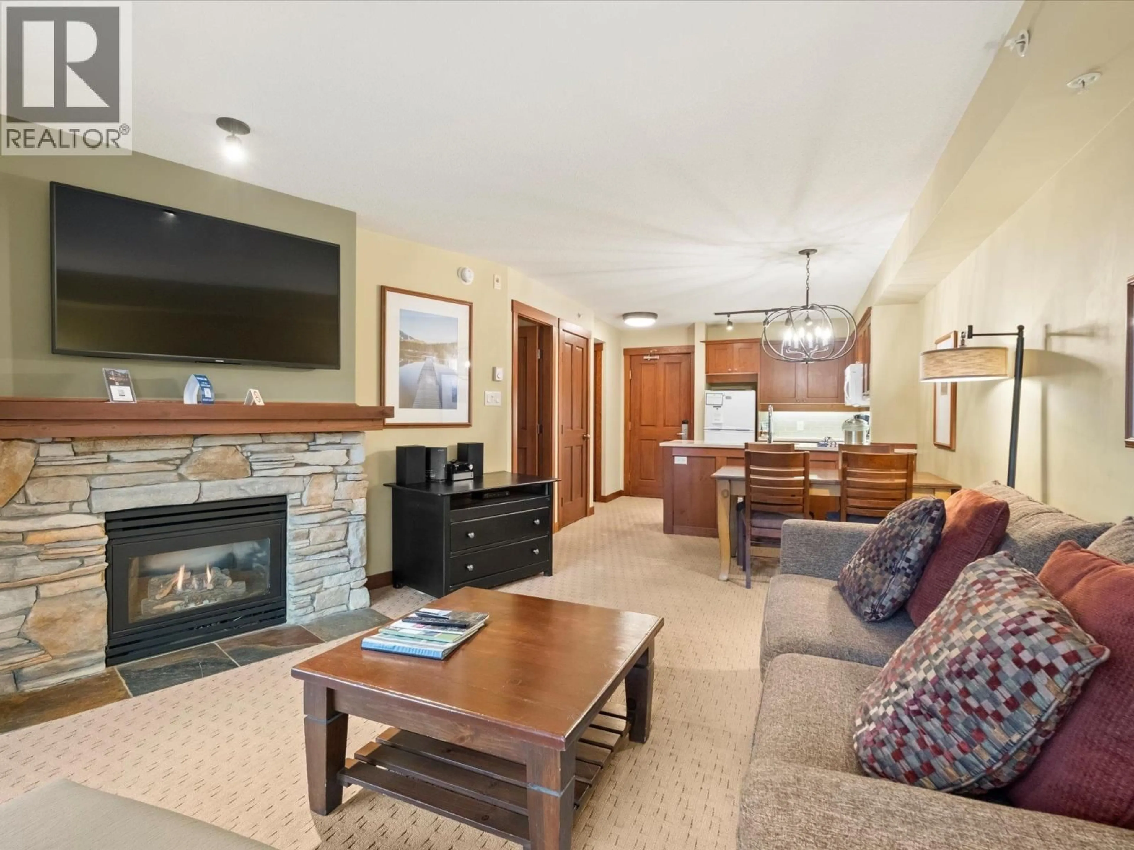 Living room with furniture, unknown for 412G3 - 4653 BLACKCOMB WAY, Whistler British Columbia V8E0Y9