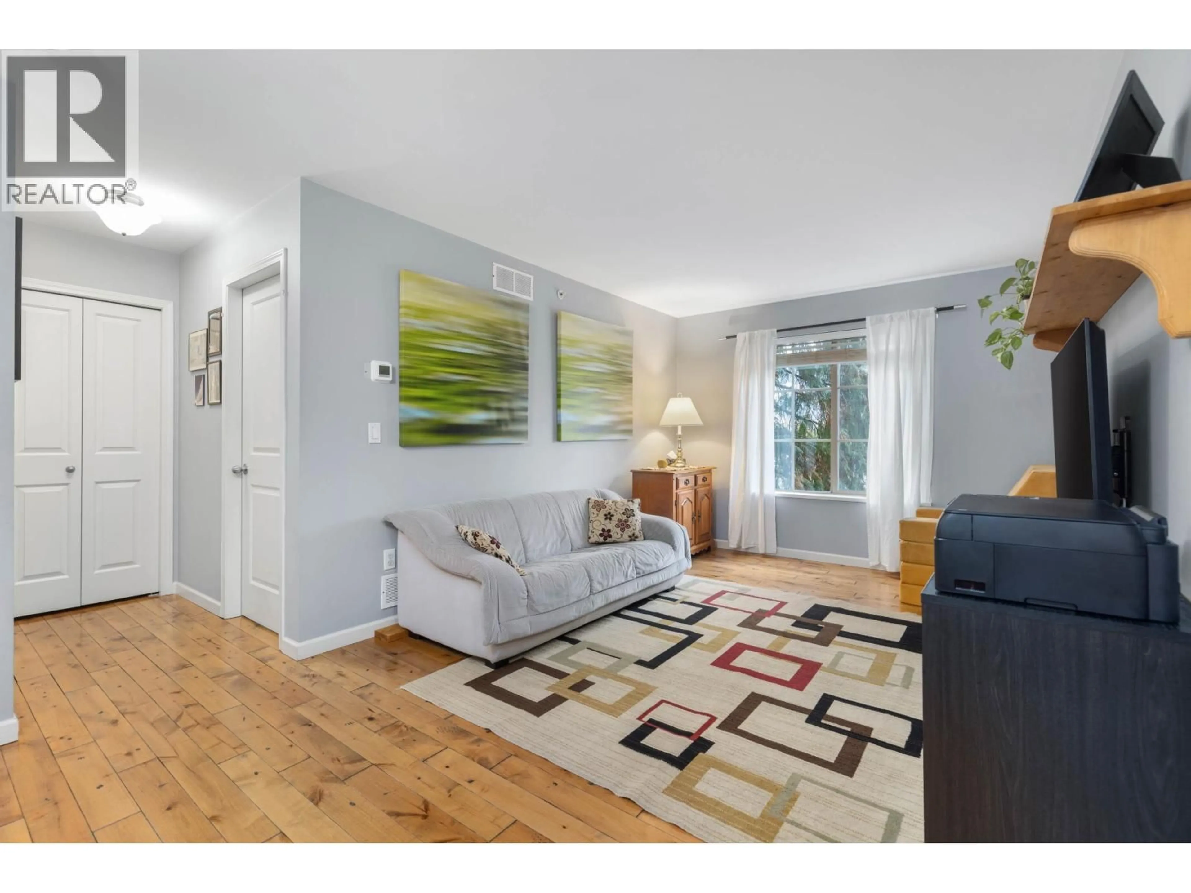 Living room with furniture, wood/laminate floor for 12 - 1442 VINE ROAD, Pemberton British Columbia V0N2L1