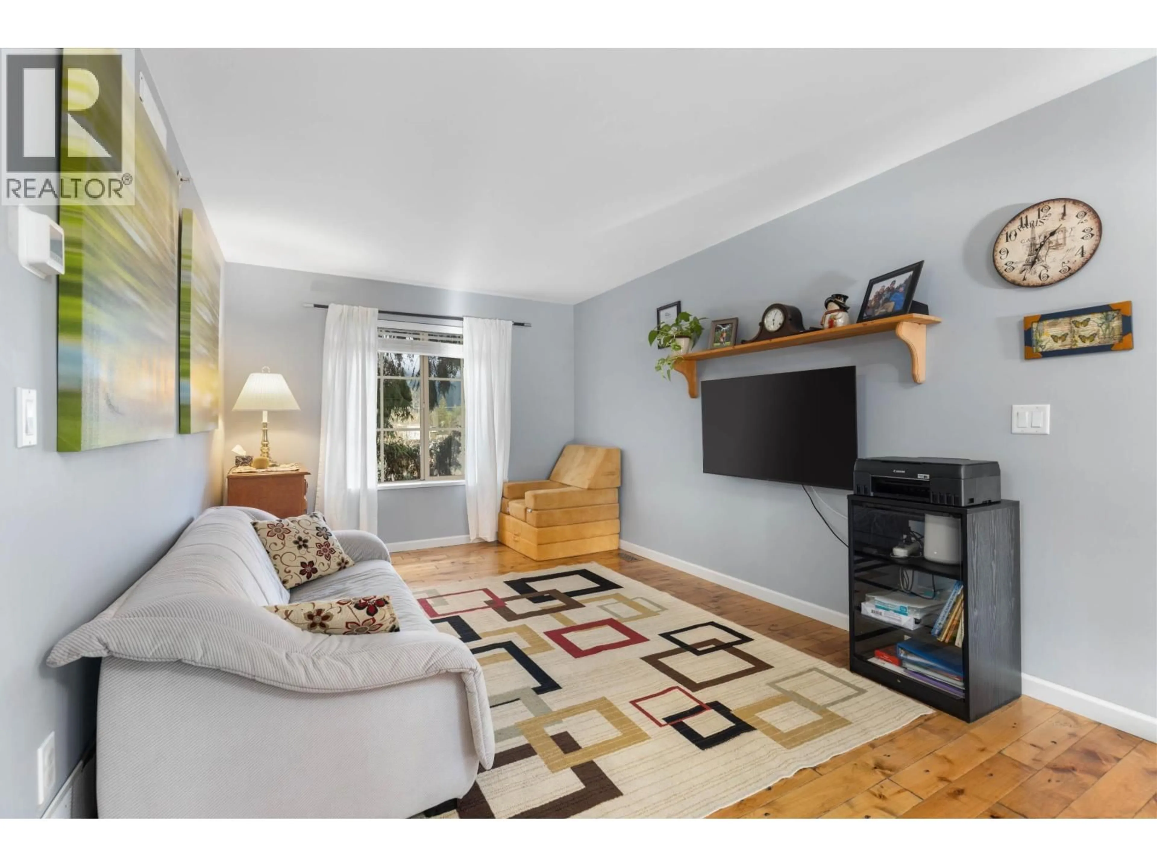 Living room with furniture, wood/laminate floor for 12 - 1442 VINE ROAD, Pemberton British Columbia V0N2L1