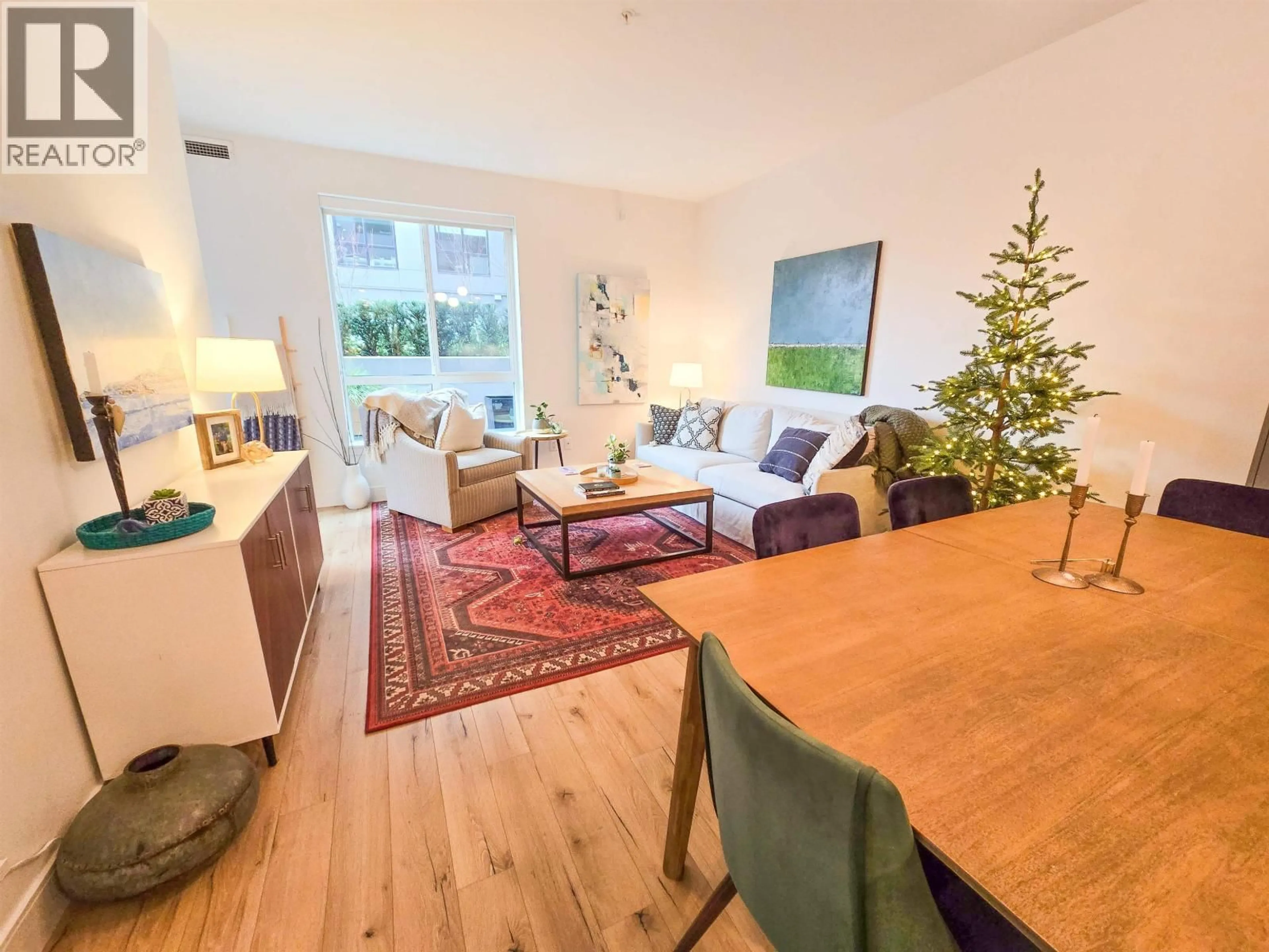 Living room with furniture, wood/laminate floor for 224 - 3131 MURRAY STREET, Port Moody British Columbia V3H0L9