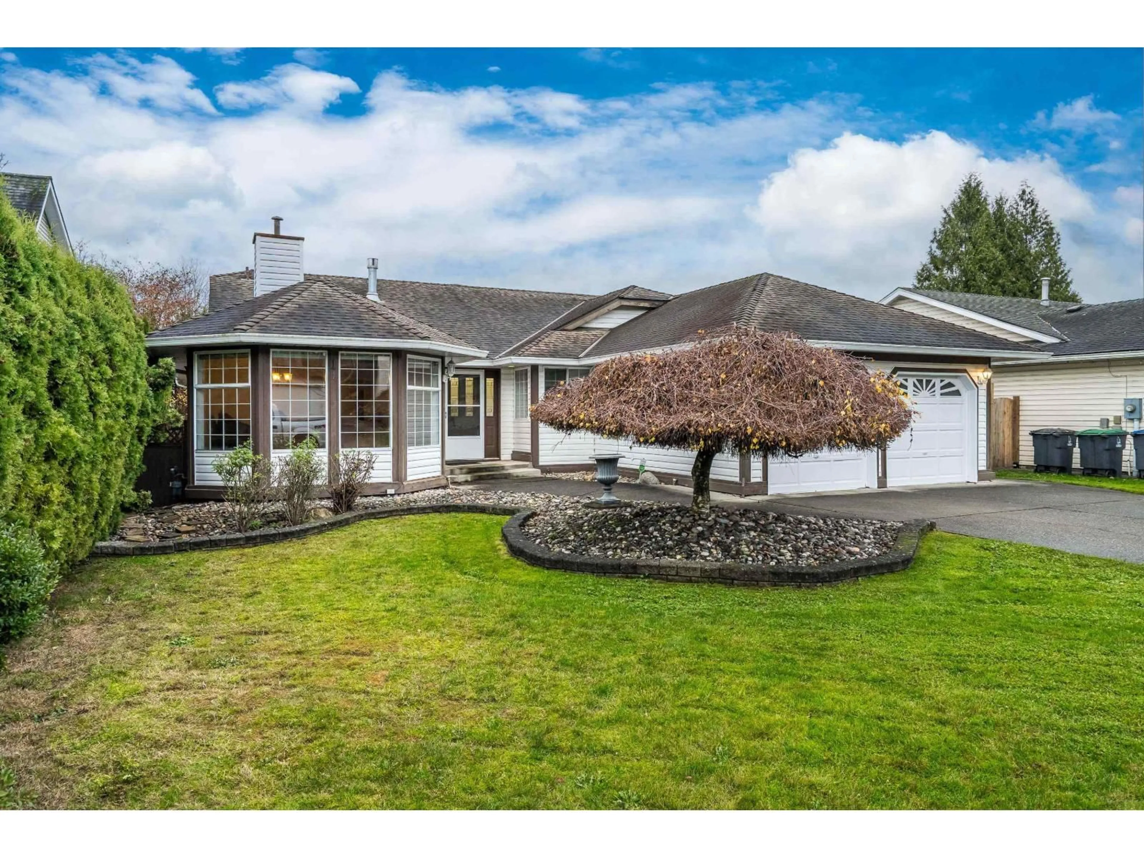 Home with vinyl exterior material, street for 9148 160A STREET, Surrey British Columbia V4N3E4