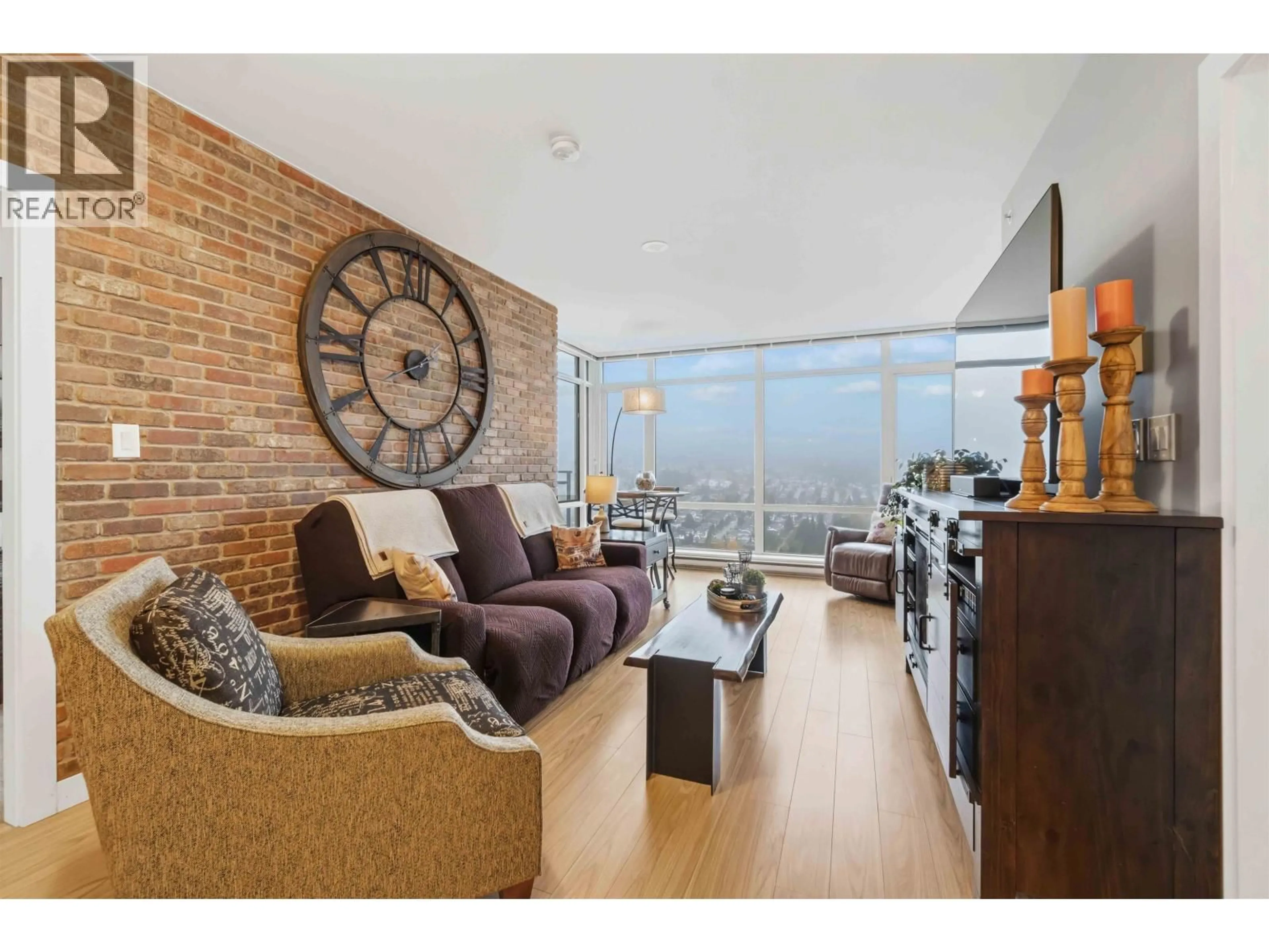 Living room with furniture, wood/laminate floor for 3901 - 2955 ATLANTIC AVENUE, Coquitlam British Columbia V3B0H9