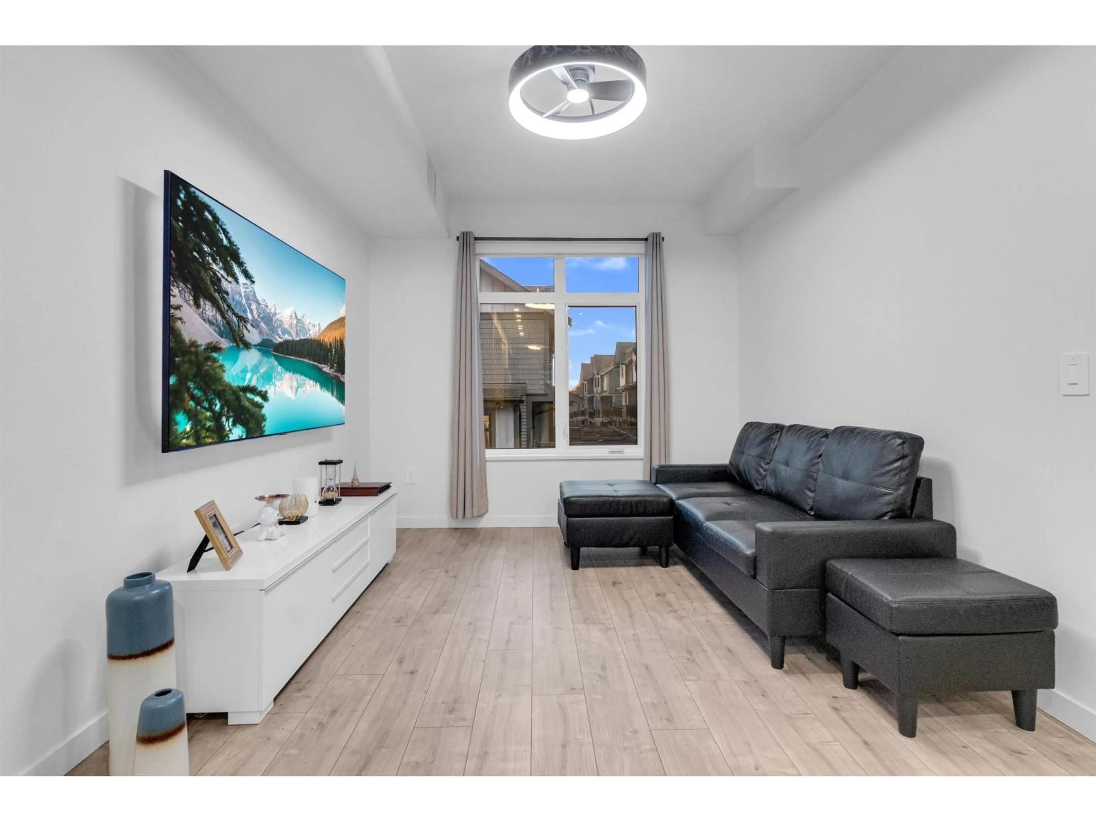 Living room with furniture, wood/laminate floor for 226 - 6951 204 STREET, Langley British Columbia V2Y3W4