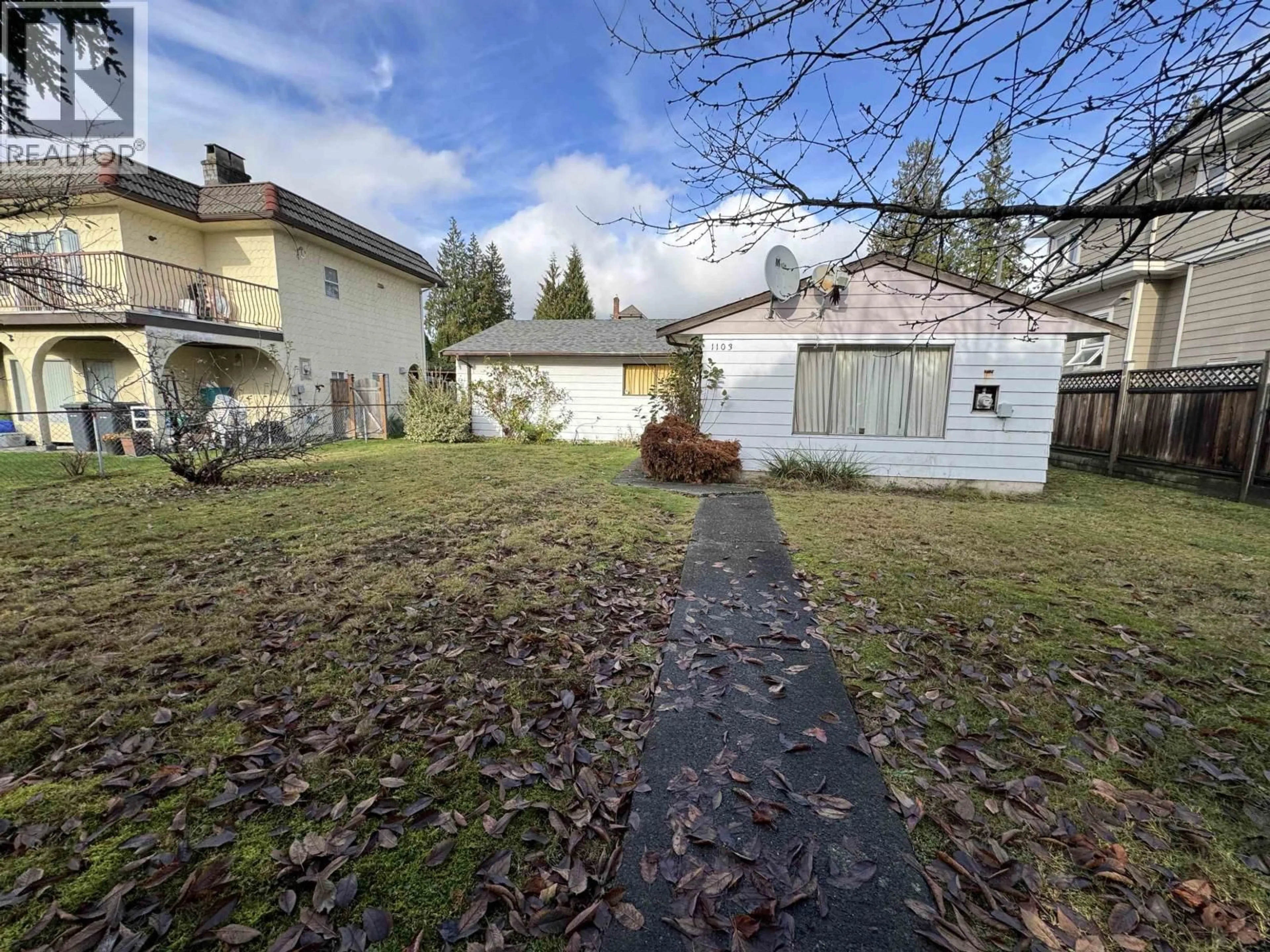 A pic from outside/outdoor area/front of a property/back of a property/a pic from drone, street for 1103 COMO LAKE AVENUE, Coquitlam British Columbia V3J3N9