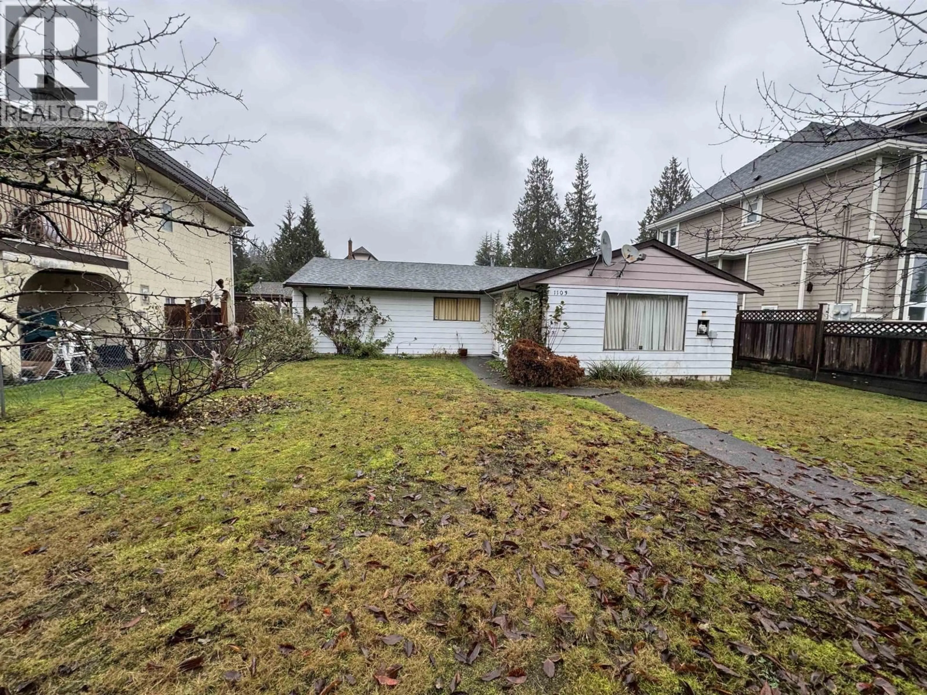 A pic from outside/outdoor area/front of a property/back of a property/a pic from drone, street for 1103 COMO LAKE AVENUE, Coquitlam British Columbia V3J3N9