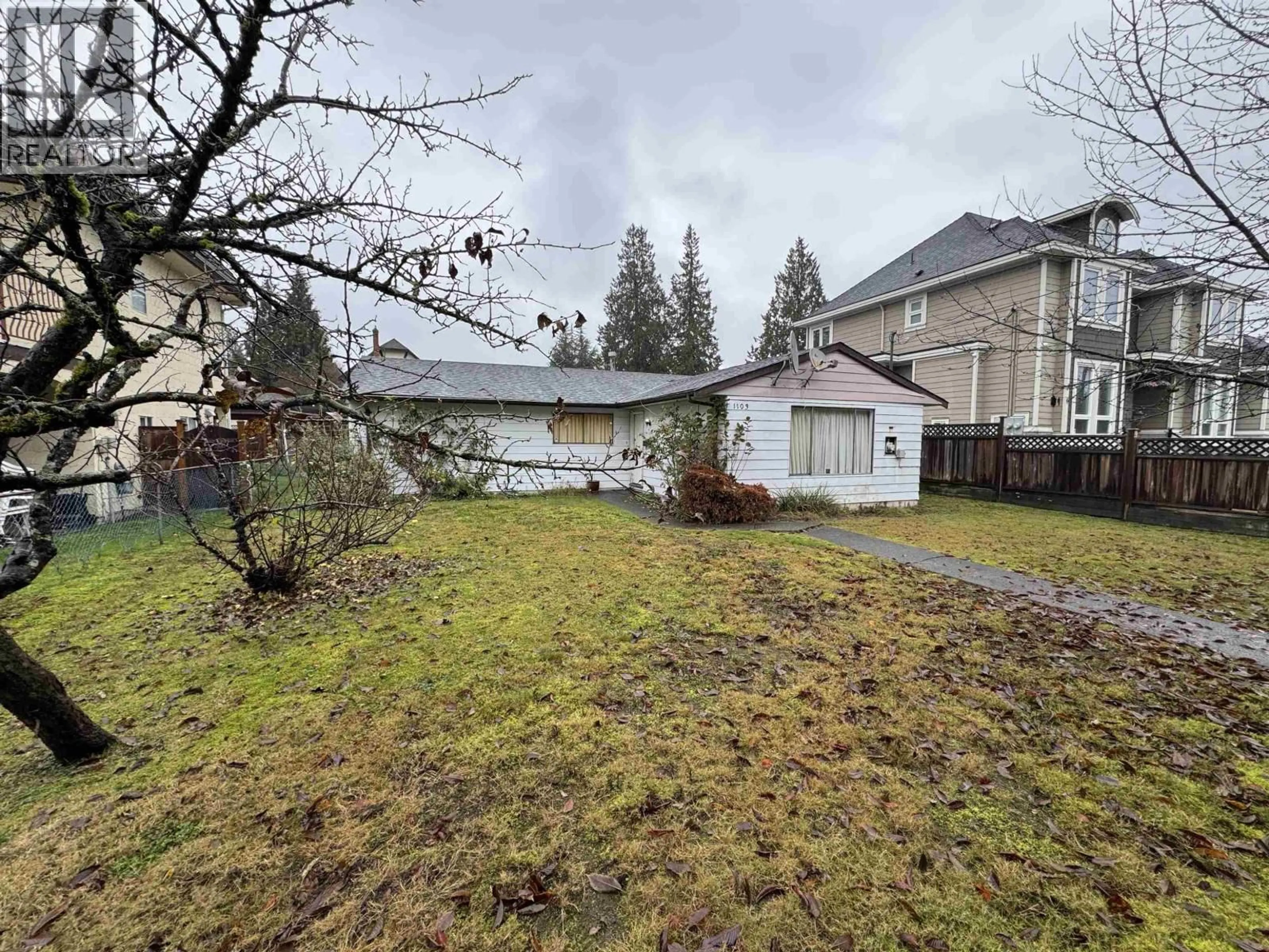 A pic from outside/outdoor area/front of a property/back of a property/a pic from drone, street for 1103 COMO LAKE AVENUE, Coquitlam British Columbia V3J3N9