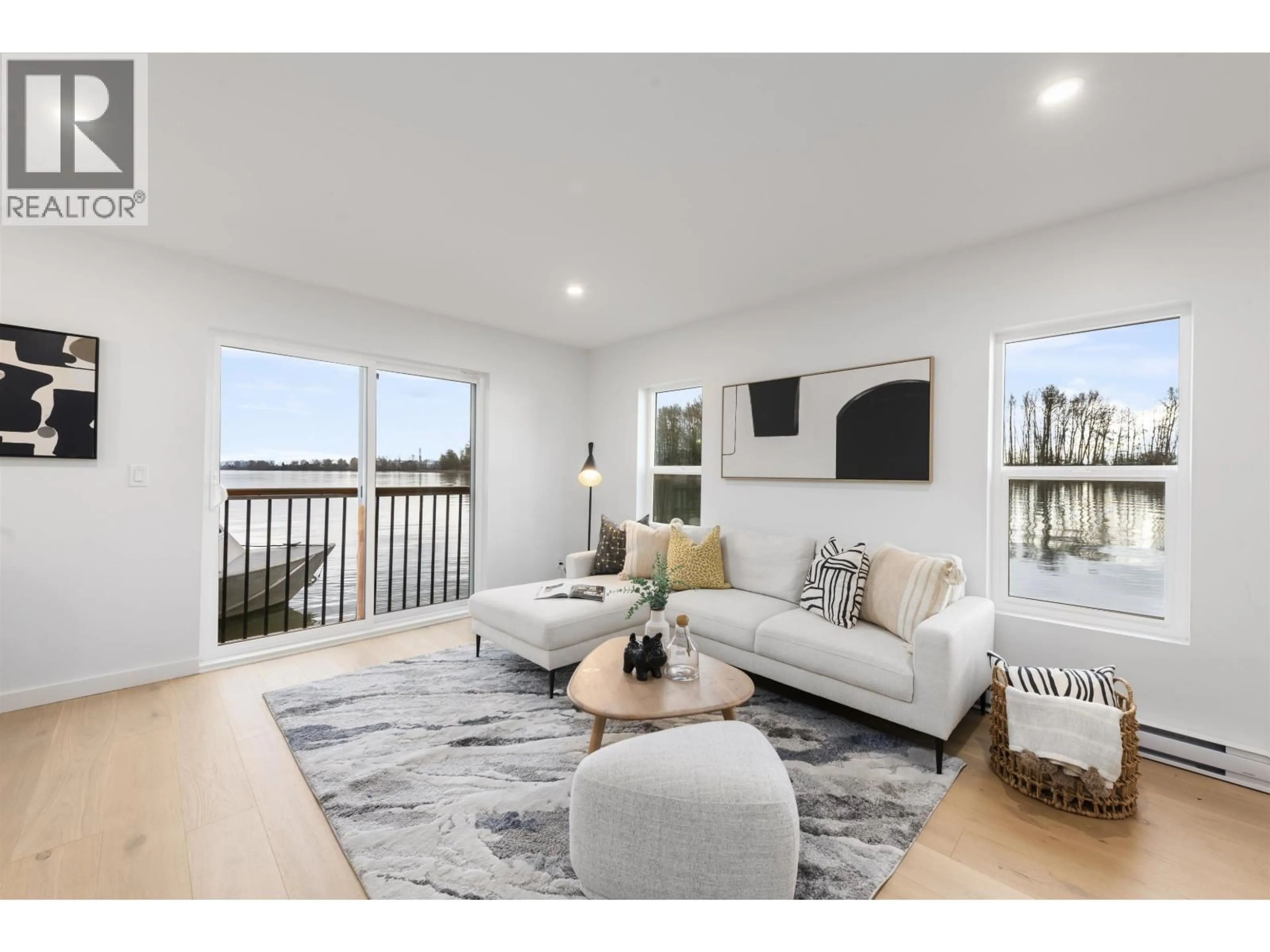 Living room with furniture, wood/laminate floor for 6911 GRAYBAR ROAD, Richmond British Columbia V6H1H3