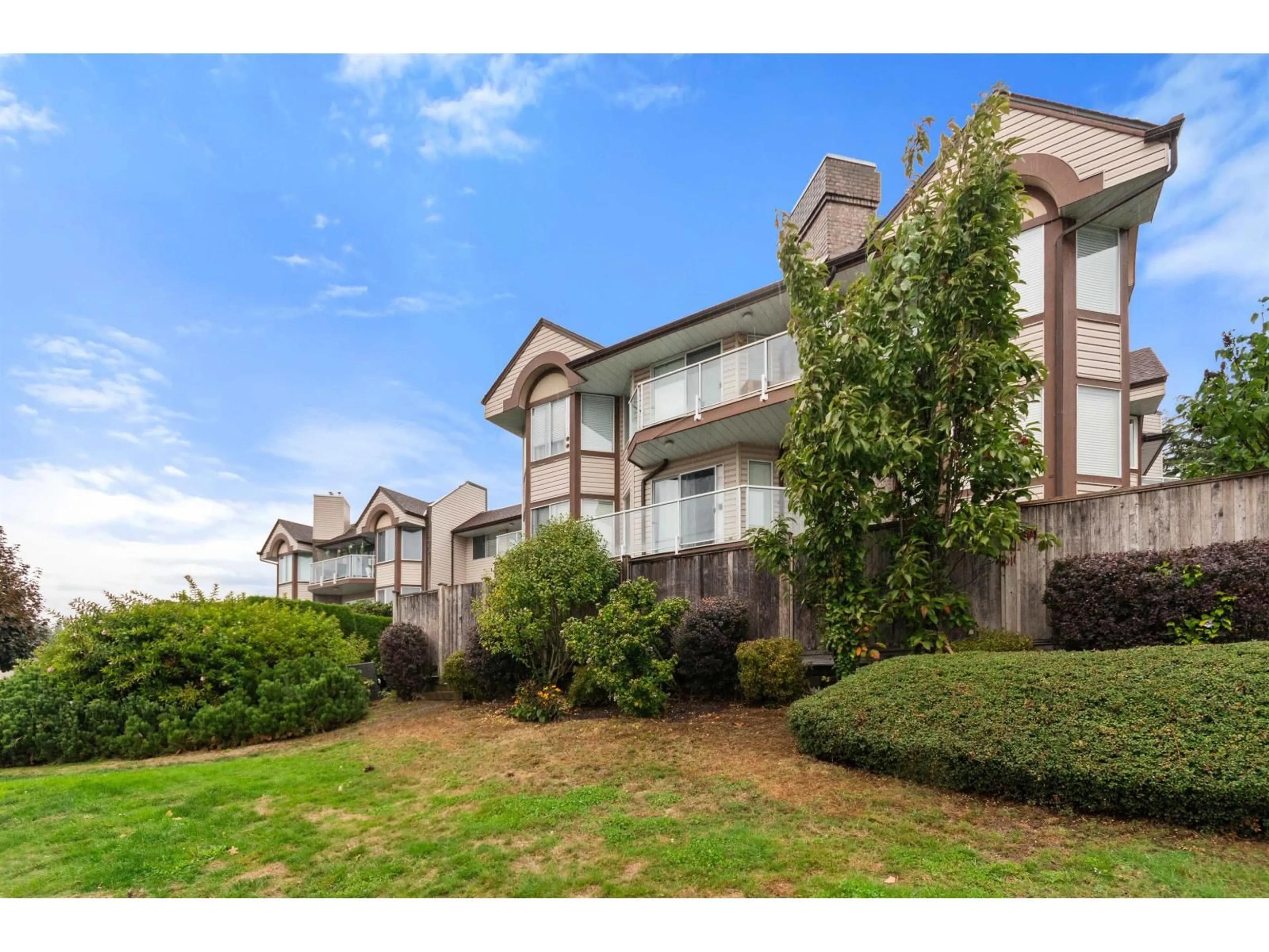 A pic from outside/outdoor area/front of a property/back of a property/a pic from drone, water/lake/river/ocean view for 205 - 32669 GEORGE FERGUSON WAY, Abbotsford British Columbia V2T4E4