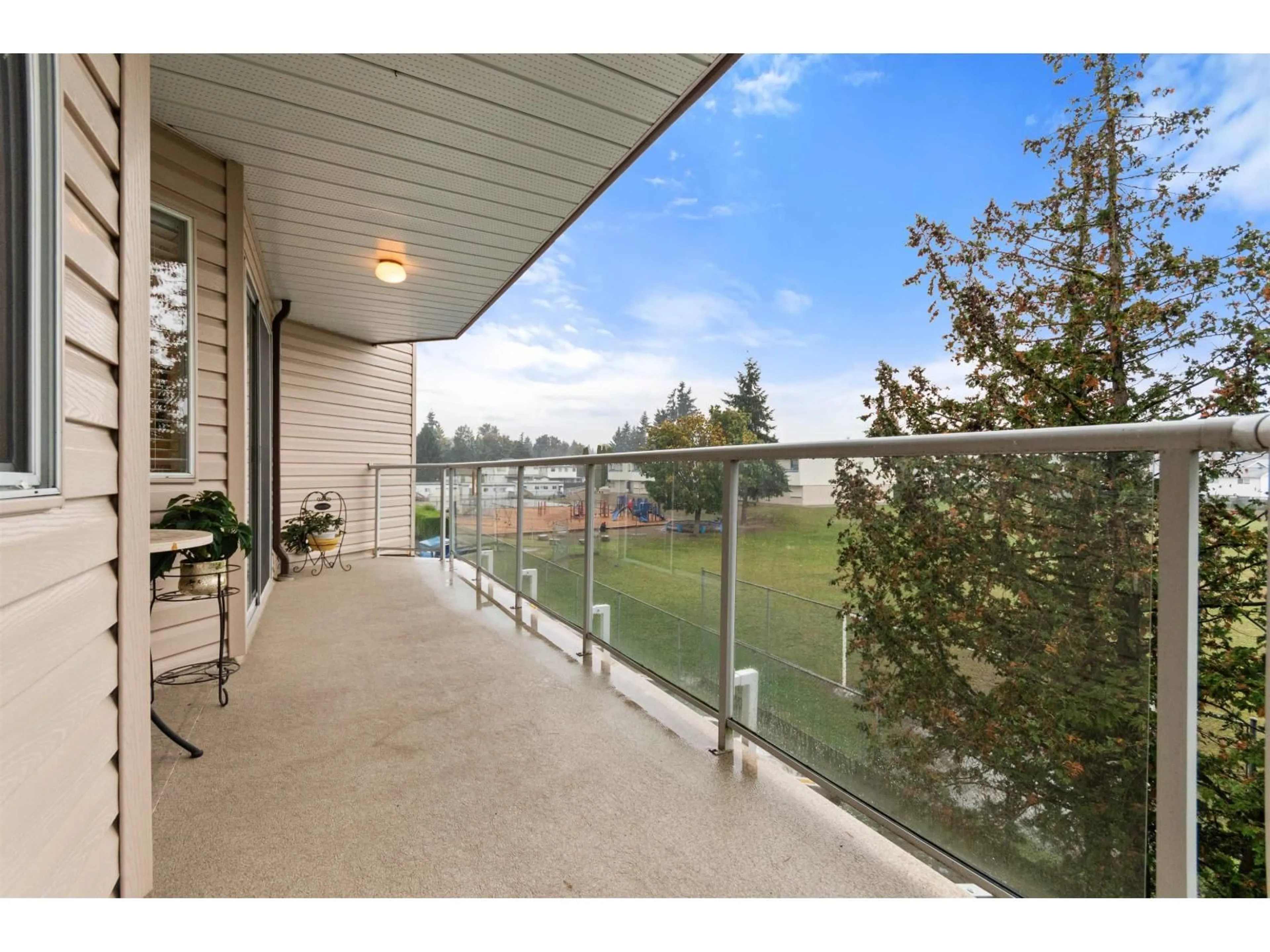 Patio, water/lake/river/ocean view for 205 - 32669 GEORGE FERGUSON WAY, Abbotsford British Columbia V2T4E4