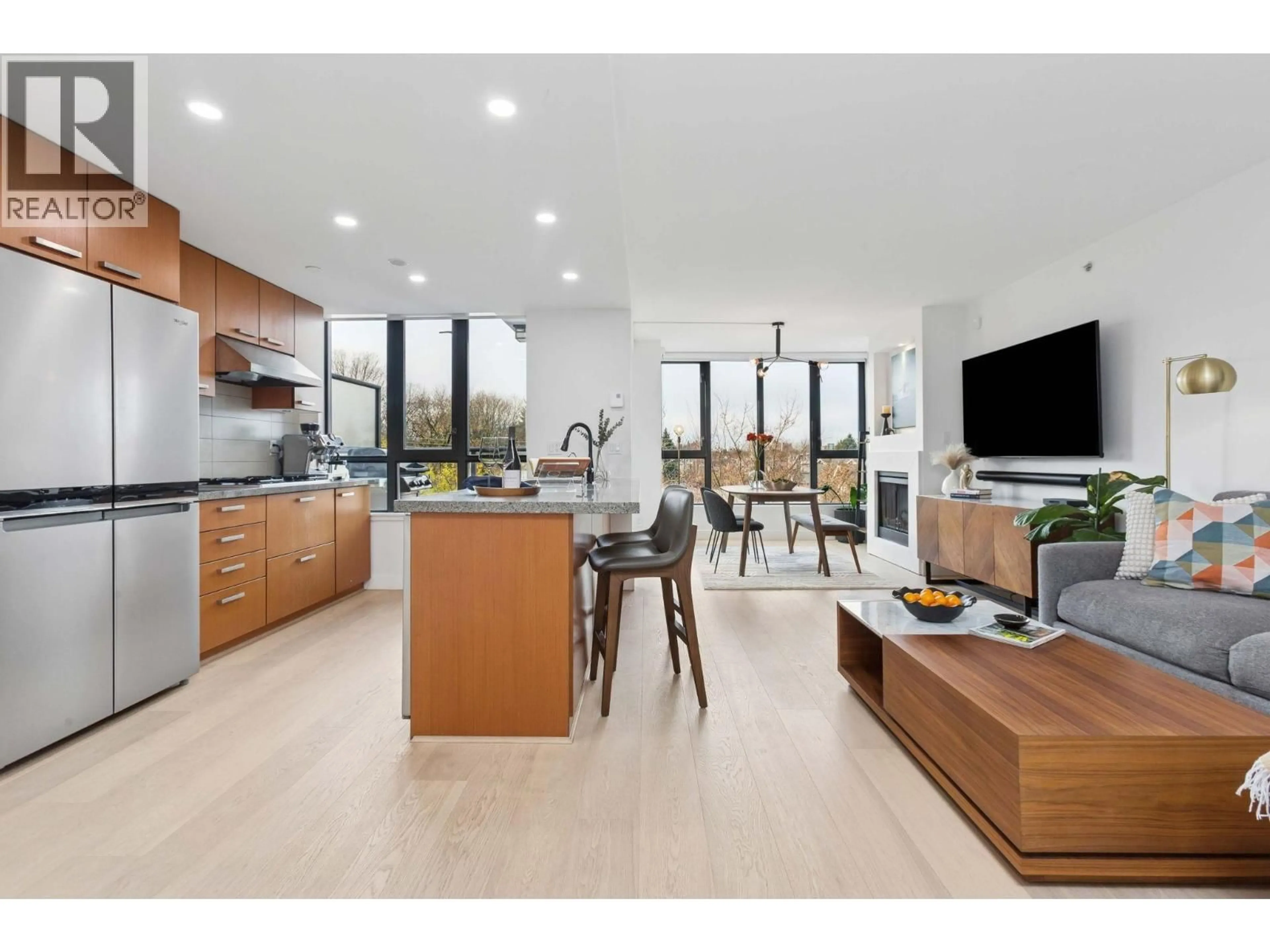 Open concept kitchen, wood/laminate floor for 426 - 3228 TUPPER STREET, Vancouver British Columbia V5Z4S7