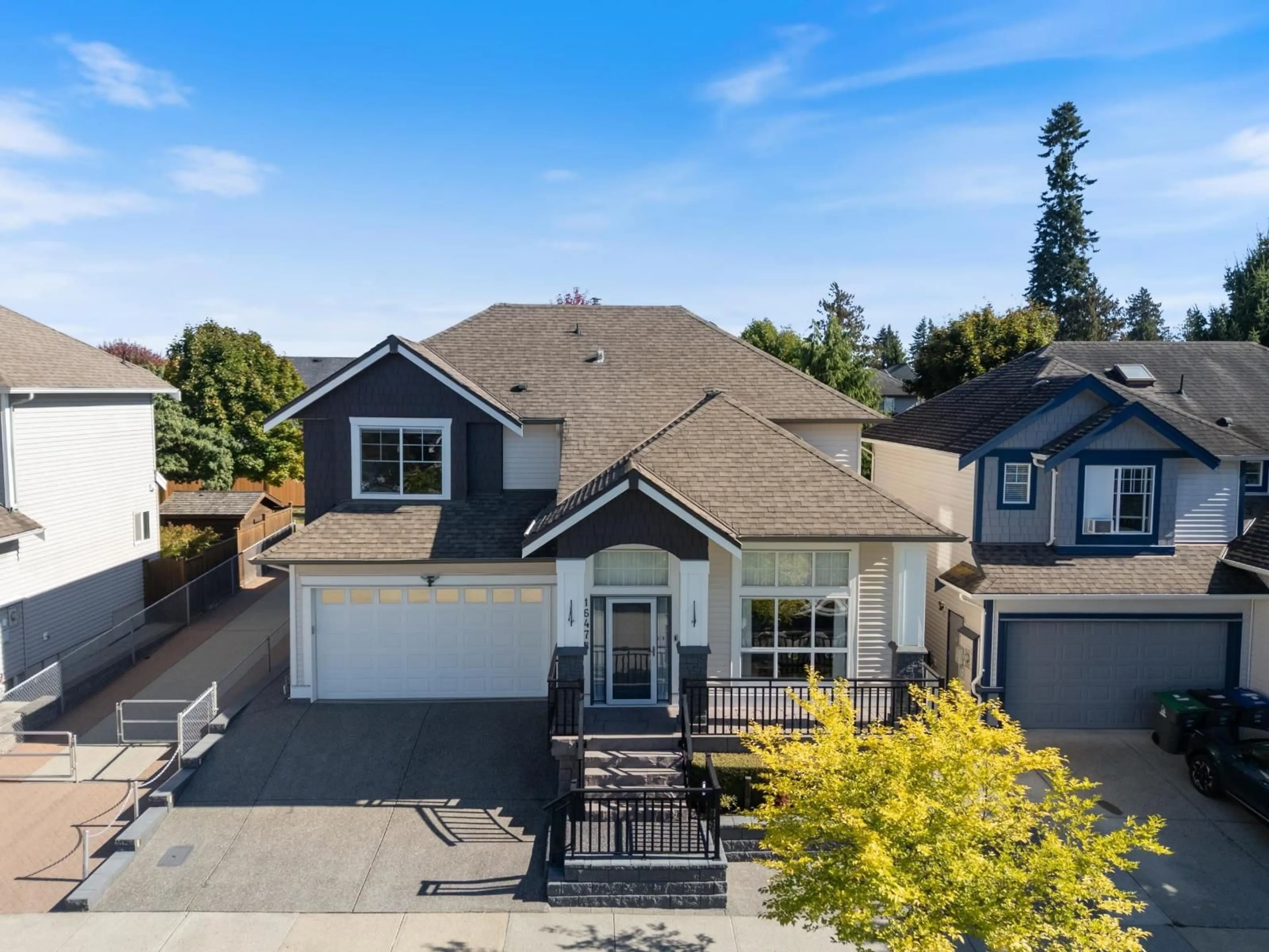 A pic from outside/outdoor area/front of a property/back of a property/a pic from drone, street for 16478 59A AVENUE, Surrey British Columbia V3S6M6