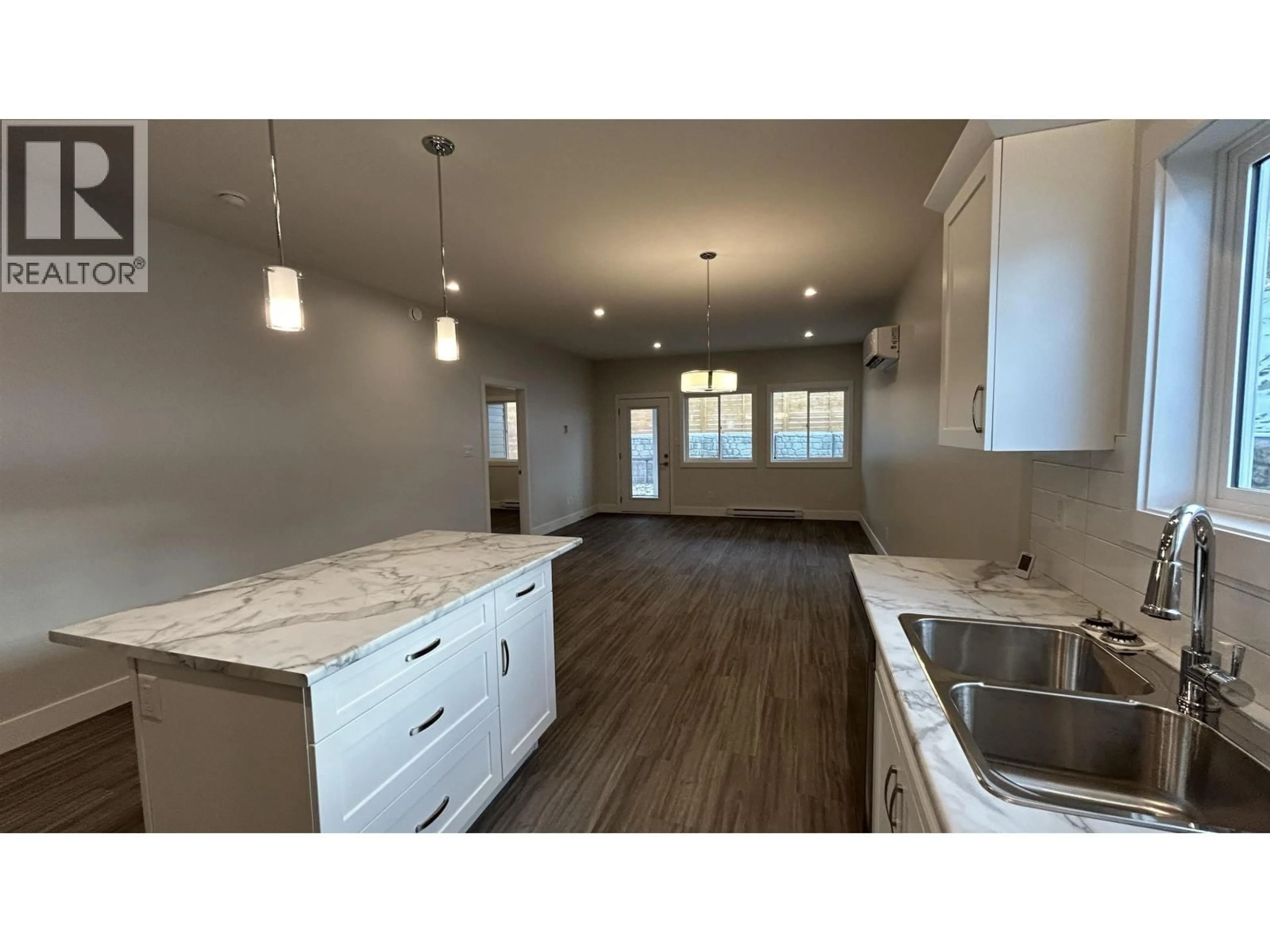Open concept kitchen, unknown for 13 - 105 FOREST RIDGE ROAD, 100 Mile House British Columbia V0K2E0