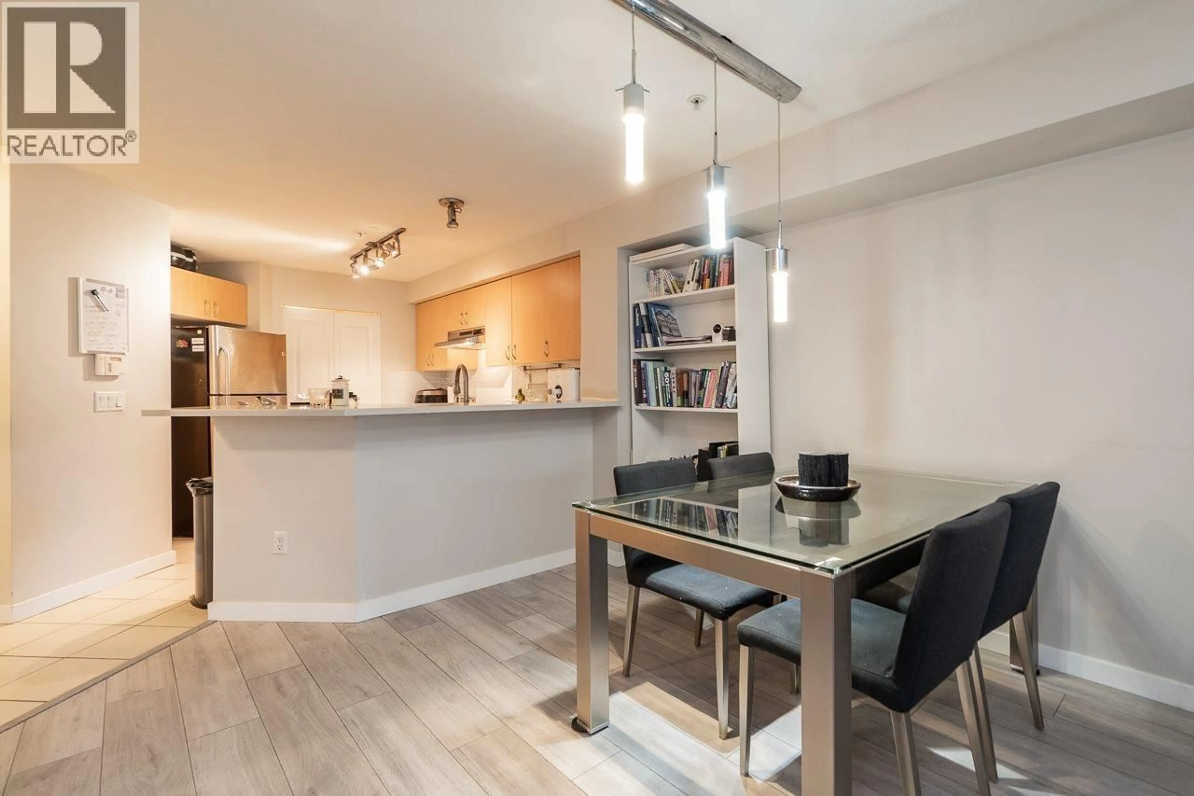 Open concept kitchen, wood/laminate floor for 116 - 9283 GOVERNMENT STREET, Burnaby British Columbia V3N0A5