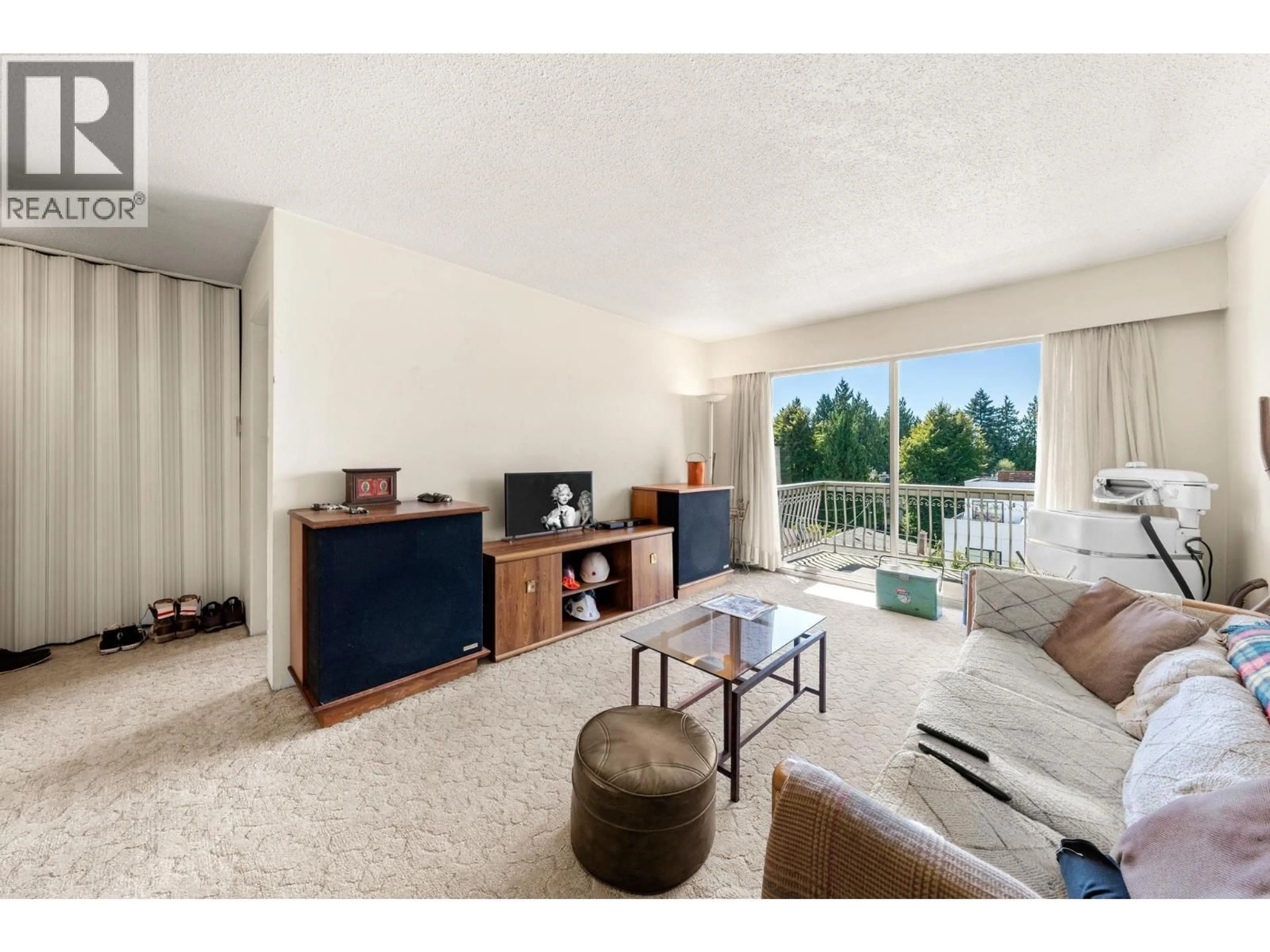 Living room with furniture, unknown for 309 - 135 21ST STREET, North Vancouver British Columbia V7M1Z2