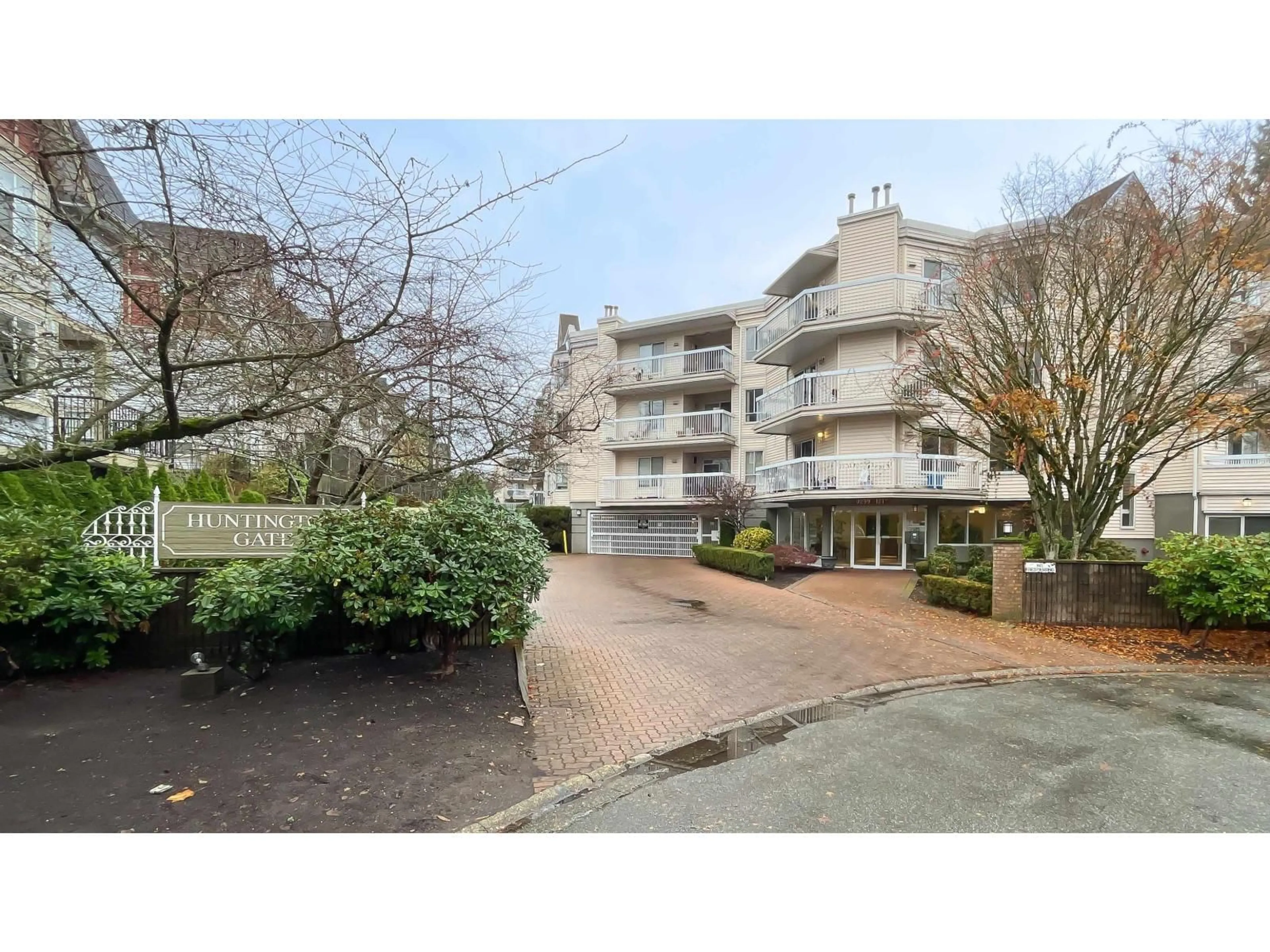 A pic from outside/outdoor area/front of a property/back of a property/a pic from drone, street for 305 - 9299 121 STREET, Surrey British Columbia V3V7X8