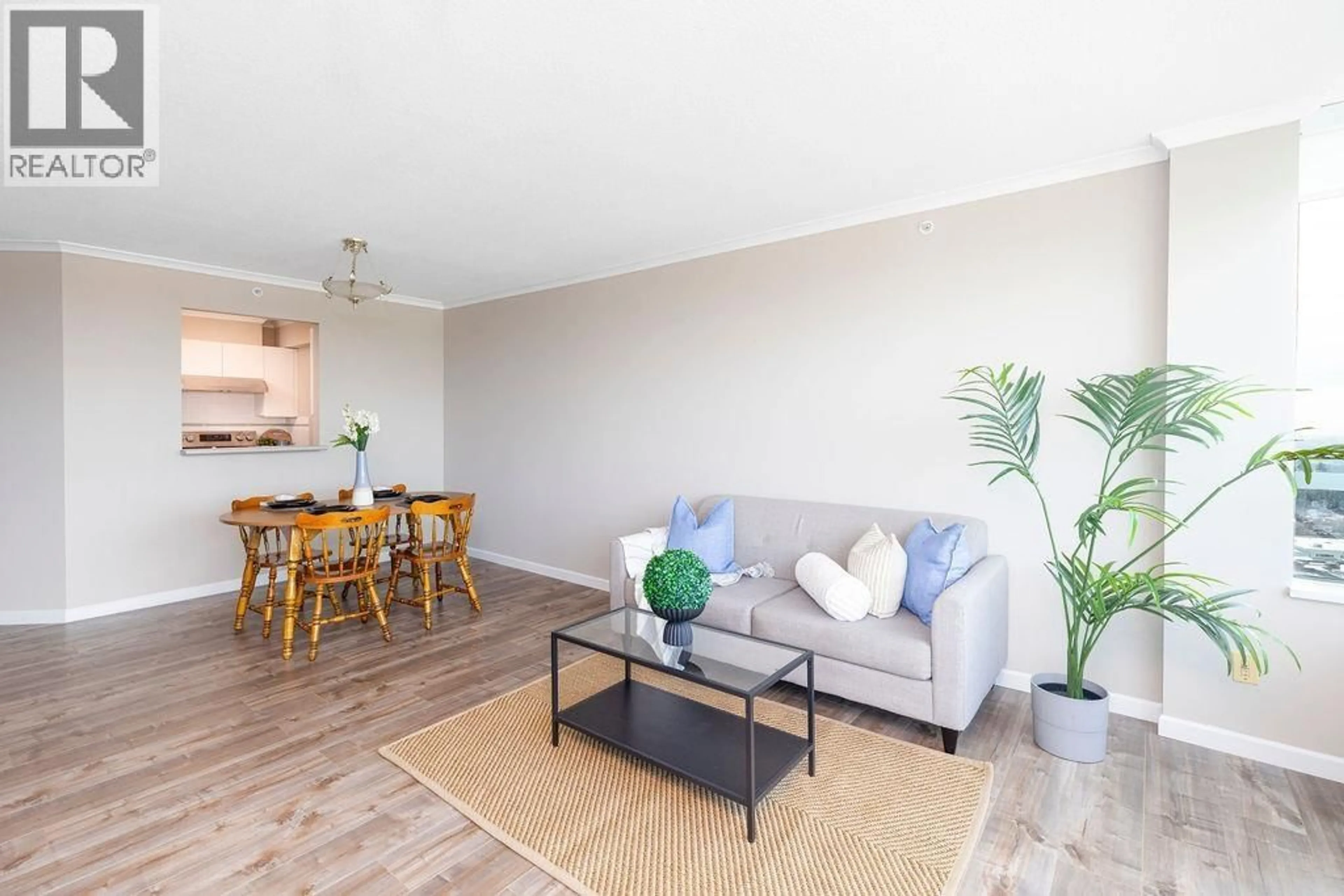 Living room with furniture, wood/laminate floor for 1402 - 6622 SOUTHOAKS CRESCENT, Burnaby British Columbia V5E4K2