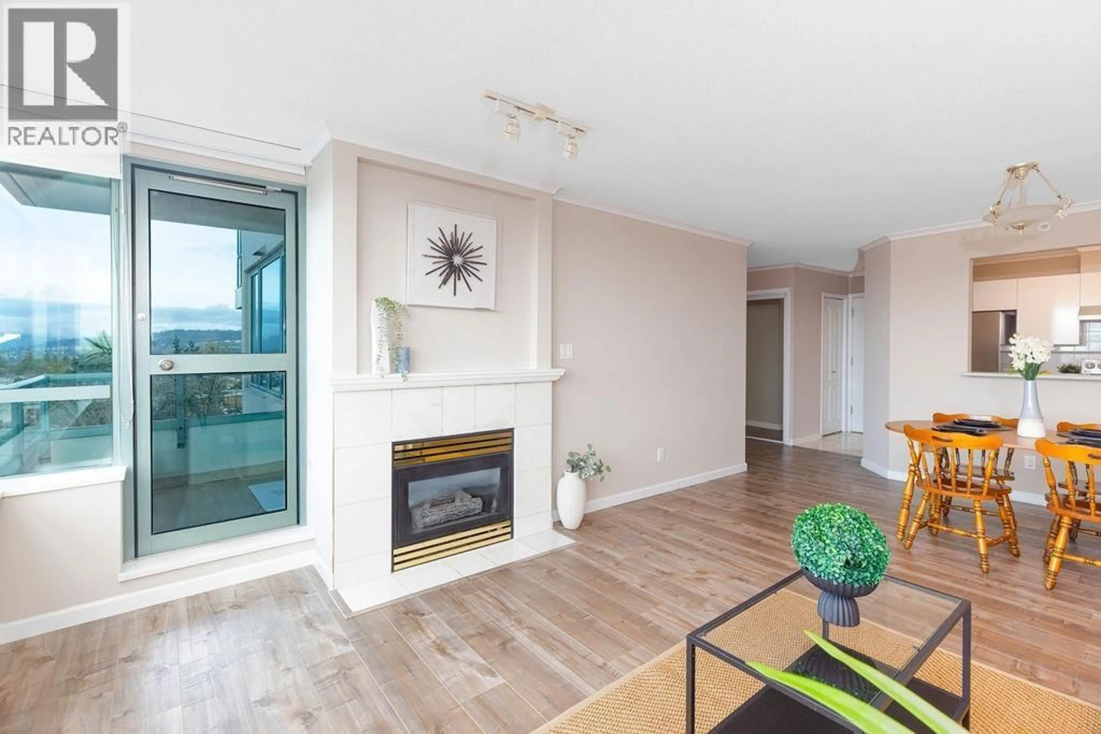 Living room with furniture, wood/laminate floor for 1402 - 6622 SOUTHOAKS CRESCENT, Burnaby British Columbia V5E4K2