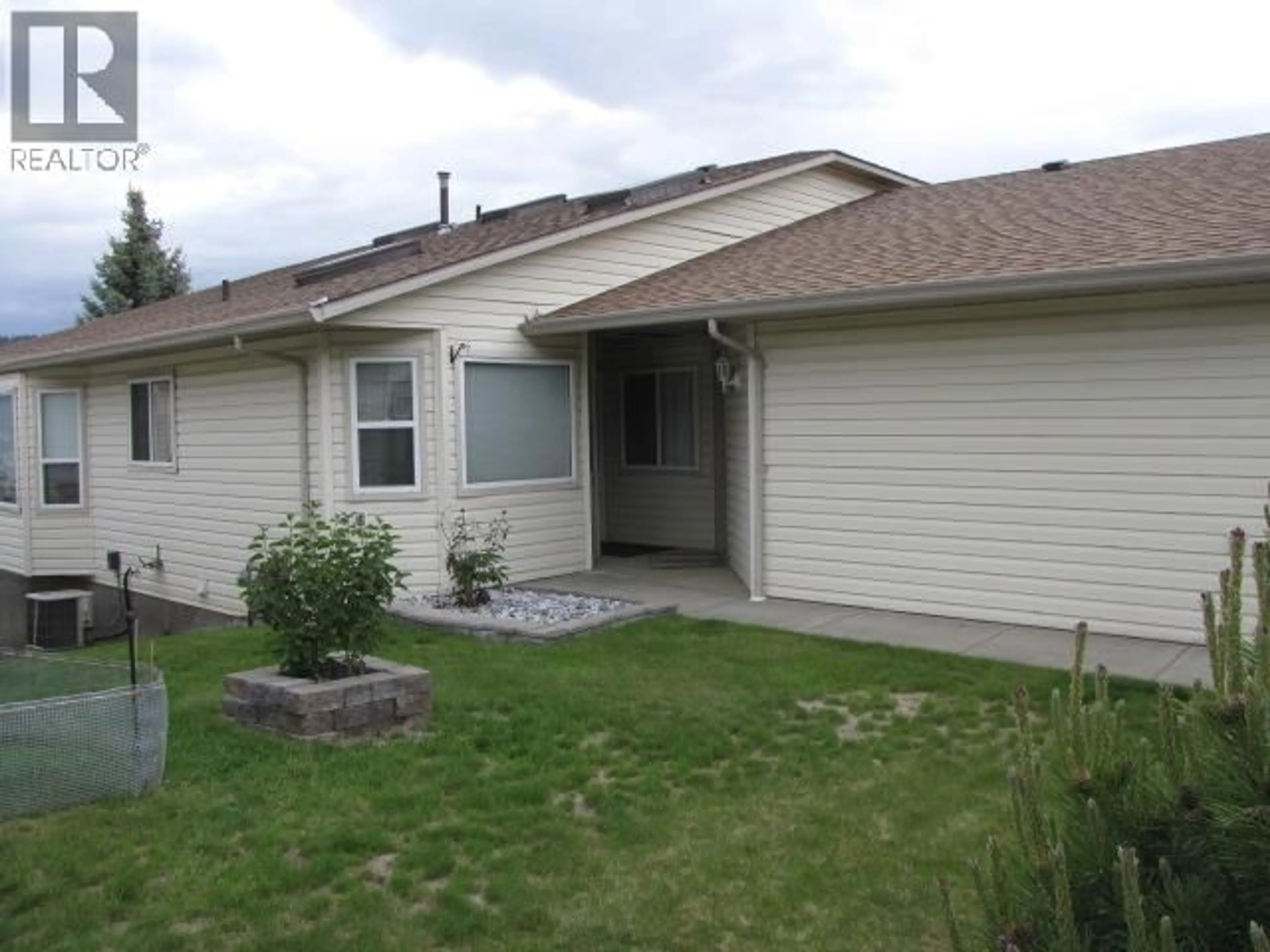 Home with vinyl exterior material, street for 56 - 500 WOTZKE DRIVE, Williams Lake British Columbia V2G4S9