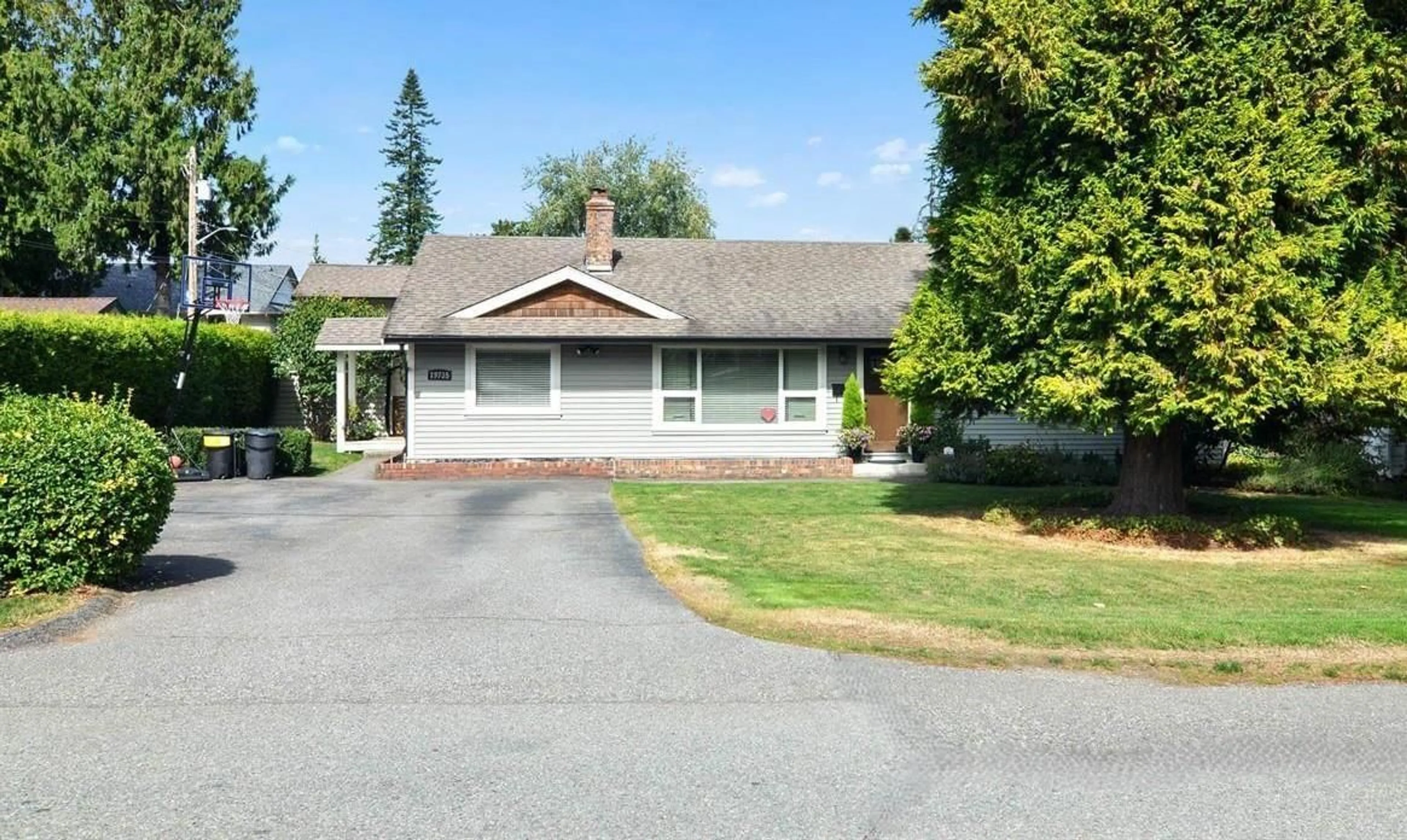 Home with vinyl exterior material, street for 19735 48 AVENUE, Langley British Columbia V3A3L2