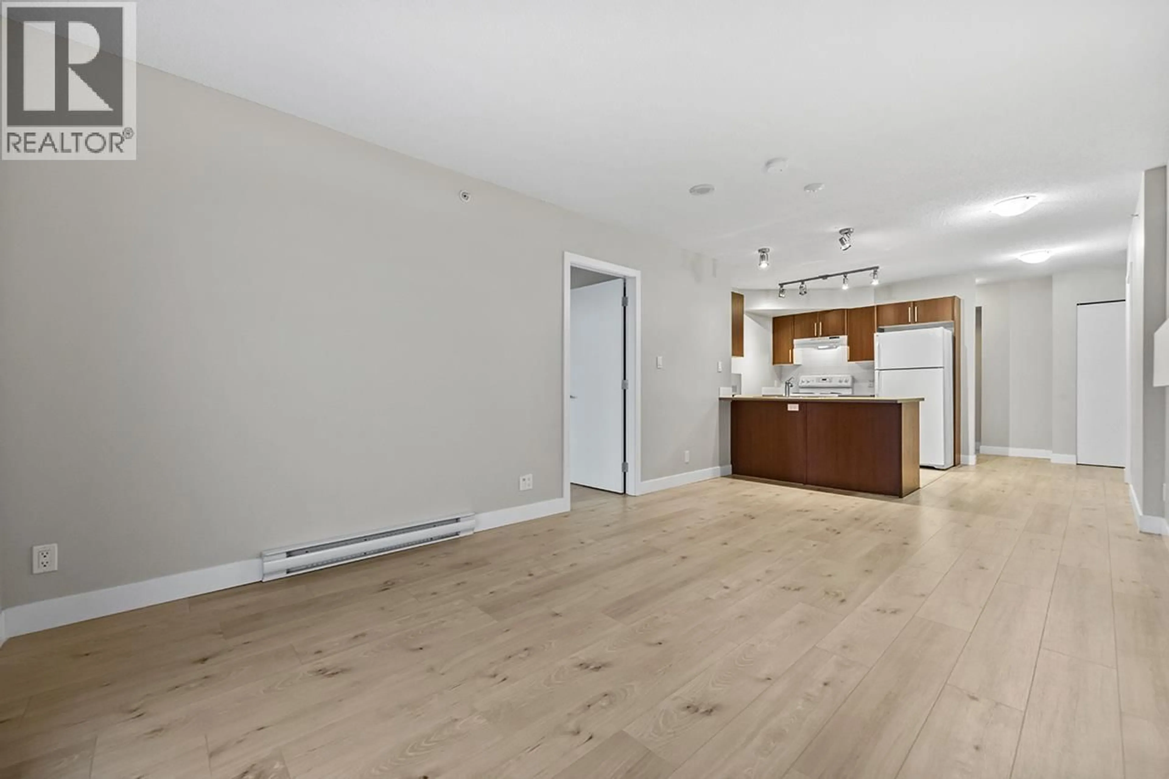 Open concept kitchen, wood/laminate floor for 3706 - 1178 HEFFLEY CRESCENT, Coquitlam British Columbia V3B0A7