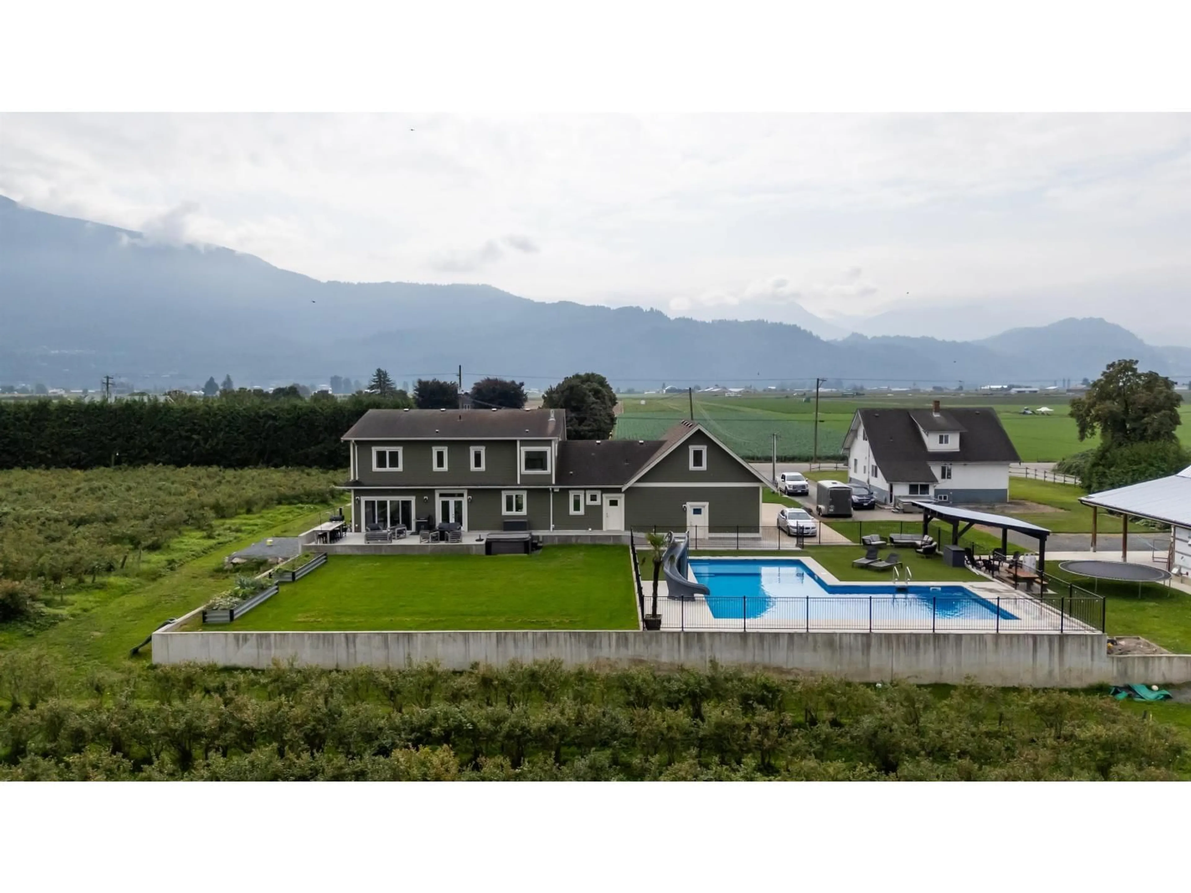 A pic from outside/outdoor area/front of a property/back of a property/a pic from drone, mountain view for 49111 CHILLIWACK CENTRAL ROAD, Chilliwack British Columbia V2P6H3