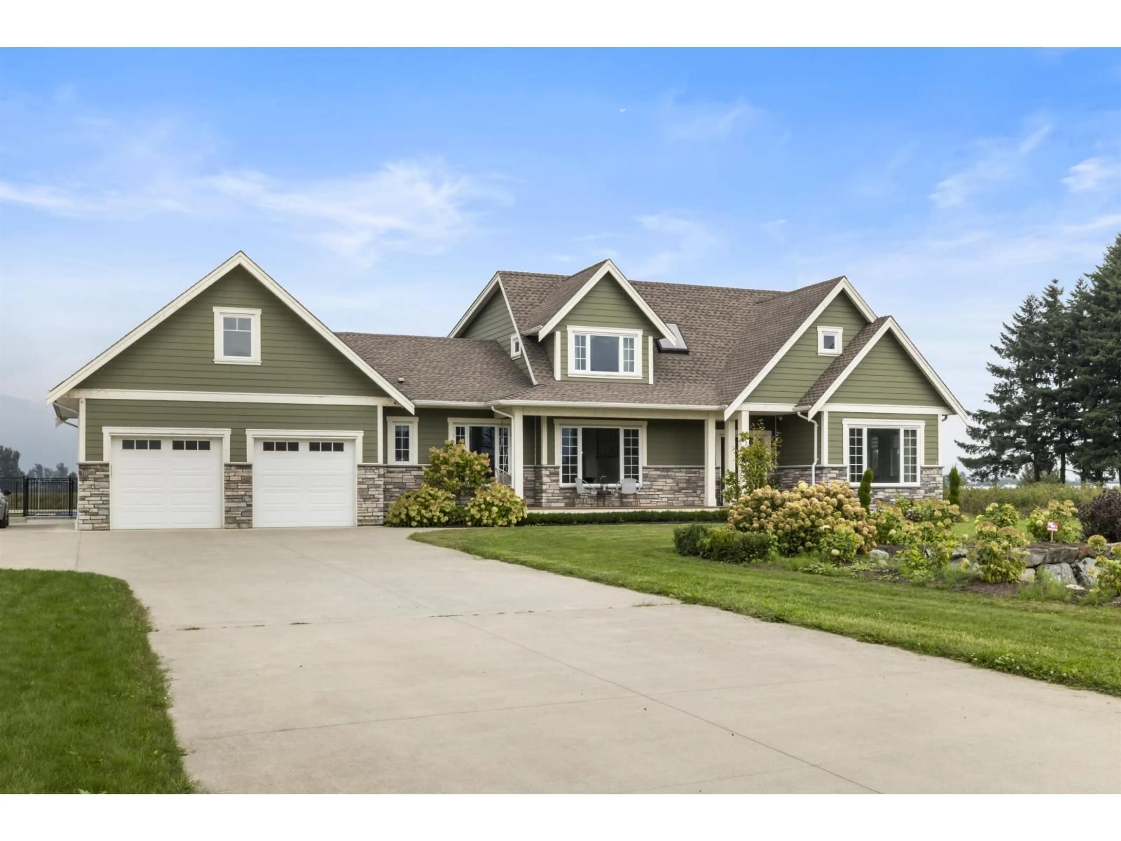 Home with vinyl exterior material, street for 49111 CHILLIWACK CENTRAL ROAD, Chilliwack British Columbia V2P6H3