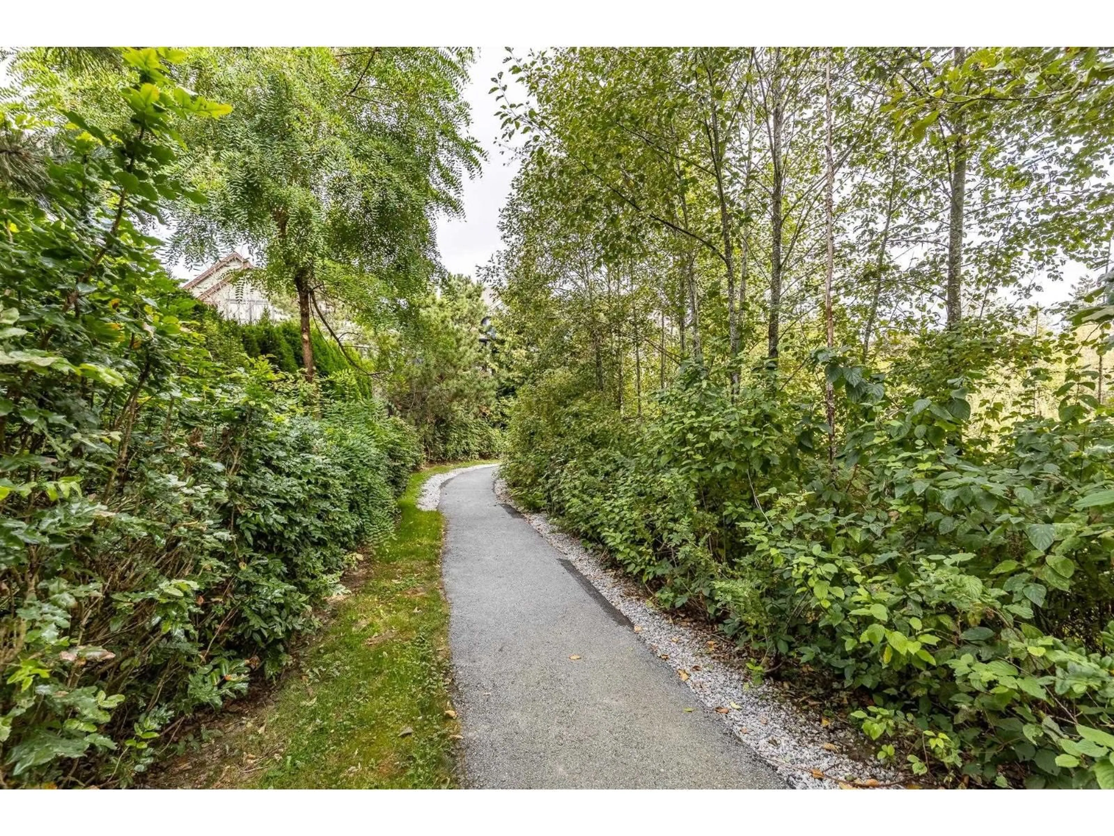 A pic from outside/outdoor area/front of a property/back of a property/a pic from drone, forest/trees view for 6 - 6828 208A STREET, Langley British Columbia V2Y2R7