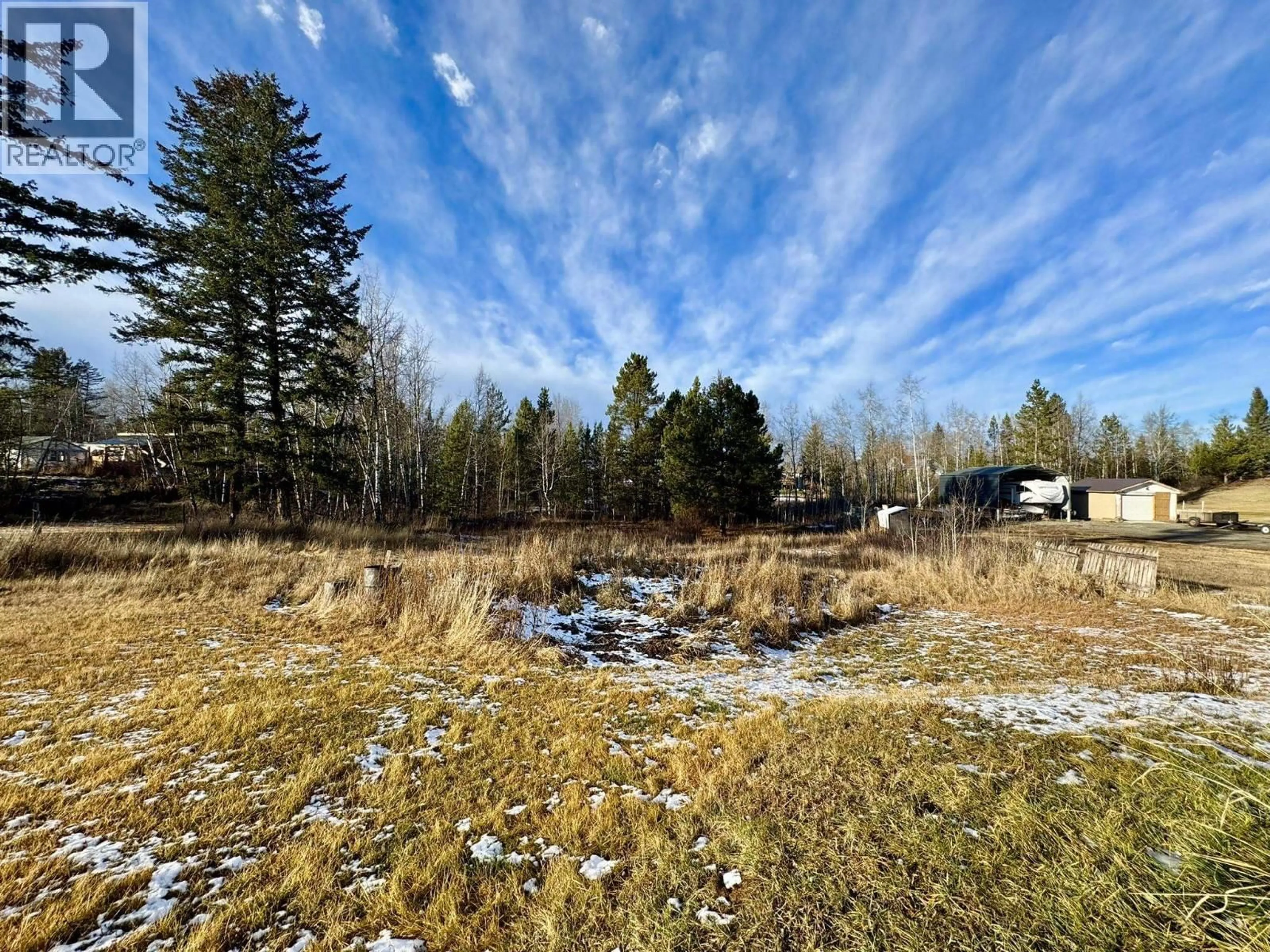 A pic from outside/outdoor area/front of a property/back of a property/a pic from drone, forest/trees view for 5563 103 MILE LAKE ROAD, 103 Mile House British Columbia V0K2E1