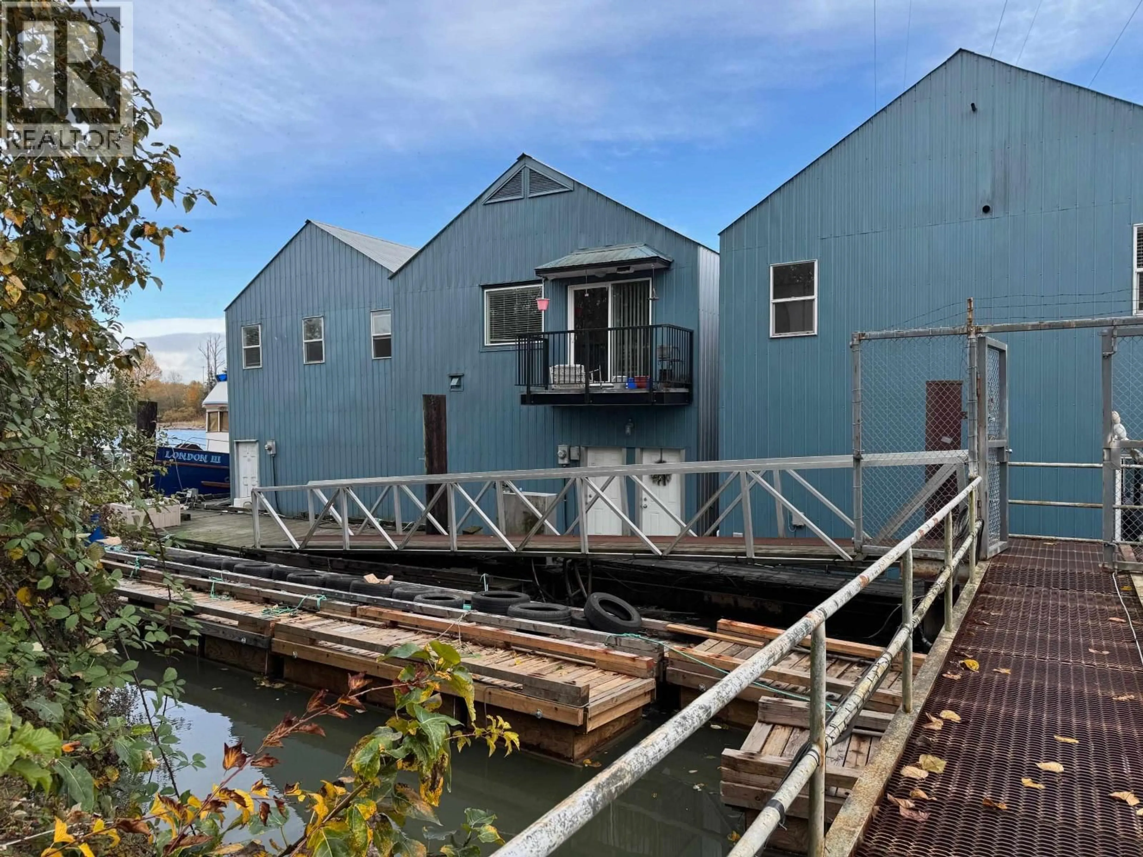 A pic from outside/outdoor area/front of a property/back of a property/a pic from drone, unknown for 4 - 23226 DYKE ROAD, Richmond British Columbia V6V1E2