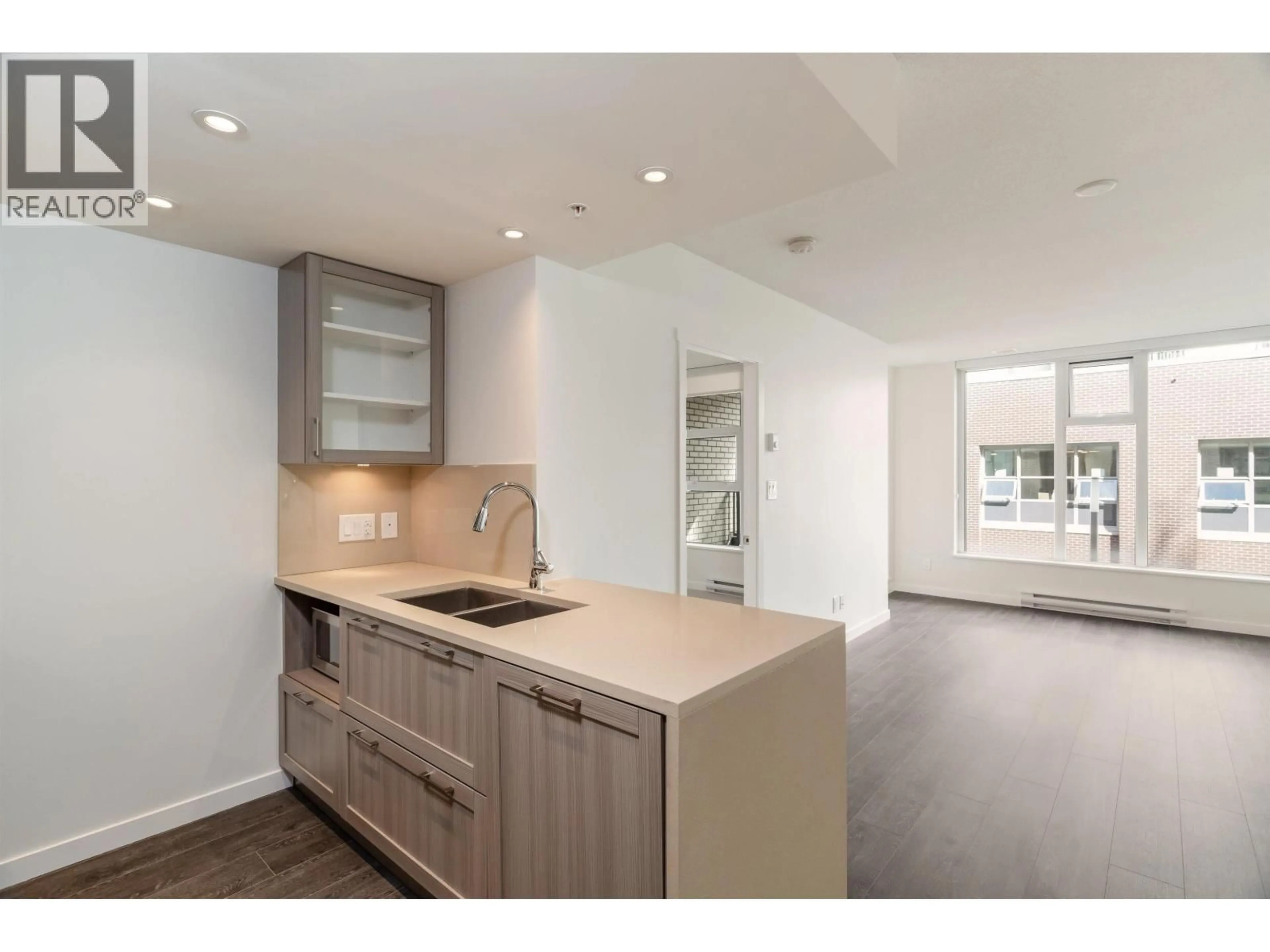 Open concept kitchen, unknown for 504 - 5598 ORMIDALE STREET, Vancouver British Columbia V5R0E5