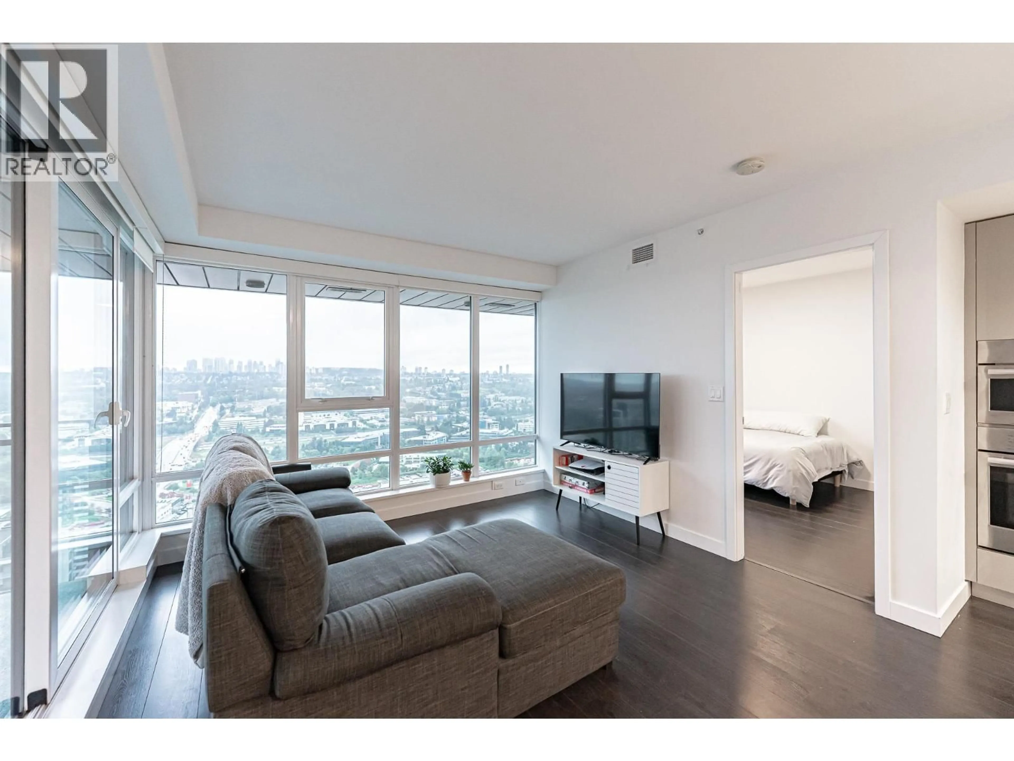 Living room with furniture, unknown for 3406 - 2085 SKYLINE COURT, Burnaby British Columbia V5C0M6