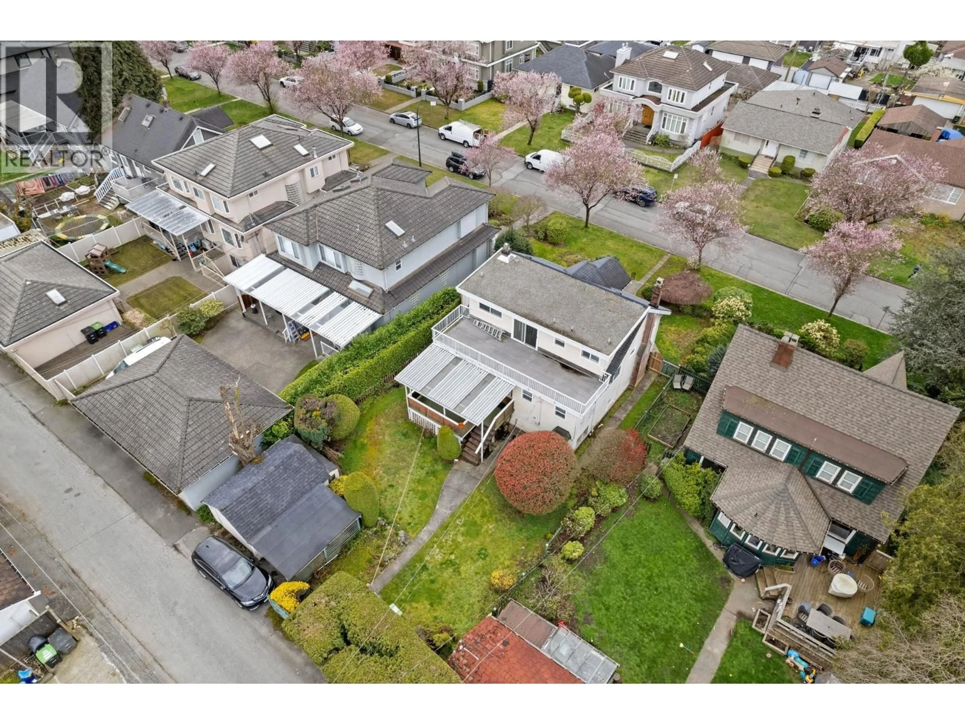 A pic from outside/outdoor area/front of a property/back of a property/a pic from drone, street for 5878 ARLINGTON STREET, Vancouver British Columbia V5R4N3