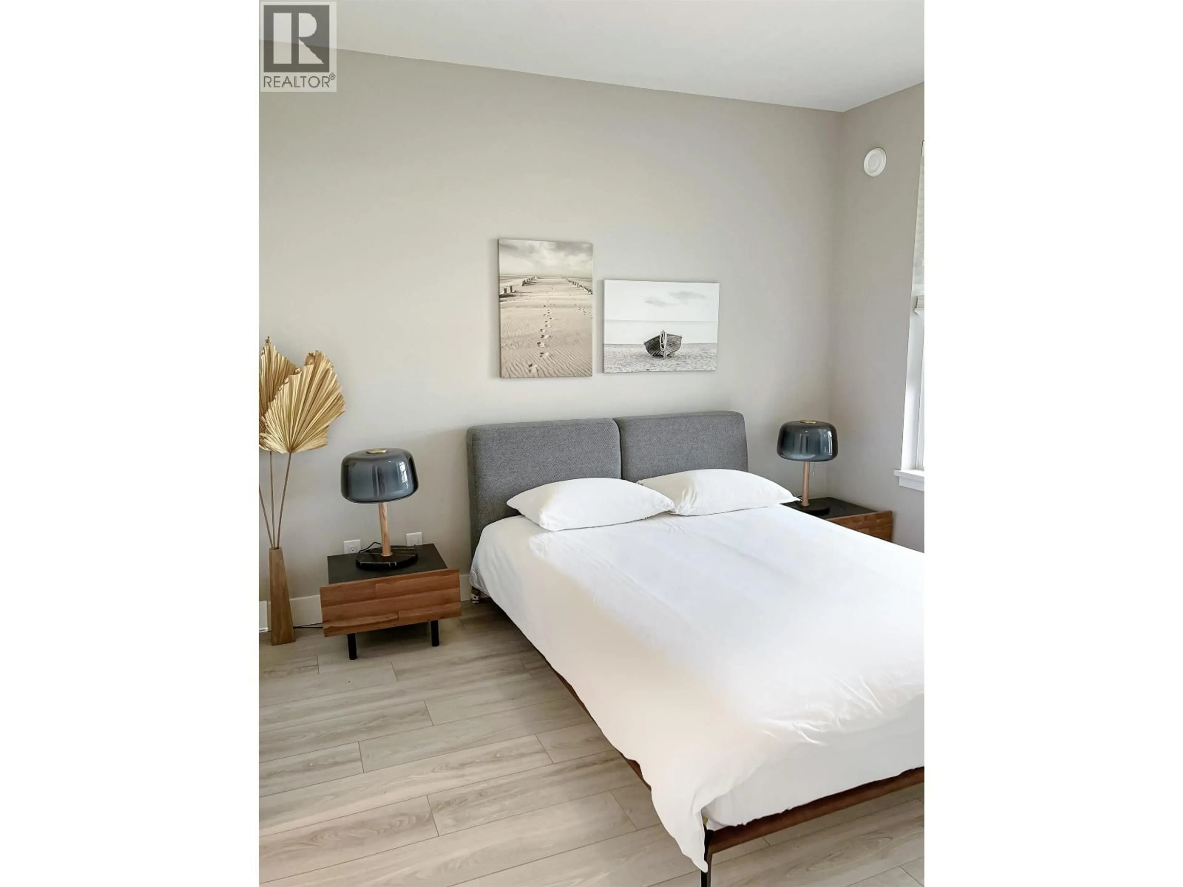 Bedroom with bed, wood/laminate floor for 323 - 4690 HAWK LANE, Tsawwassen British Columbia V4M0C4